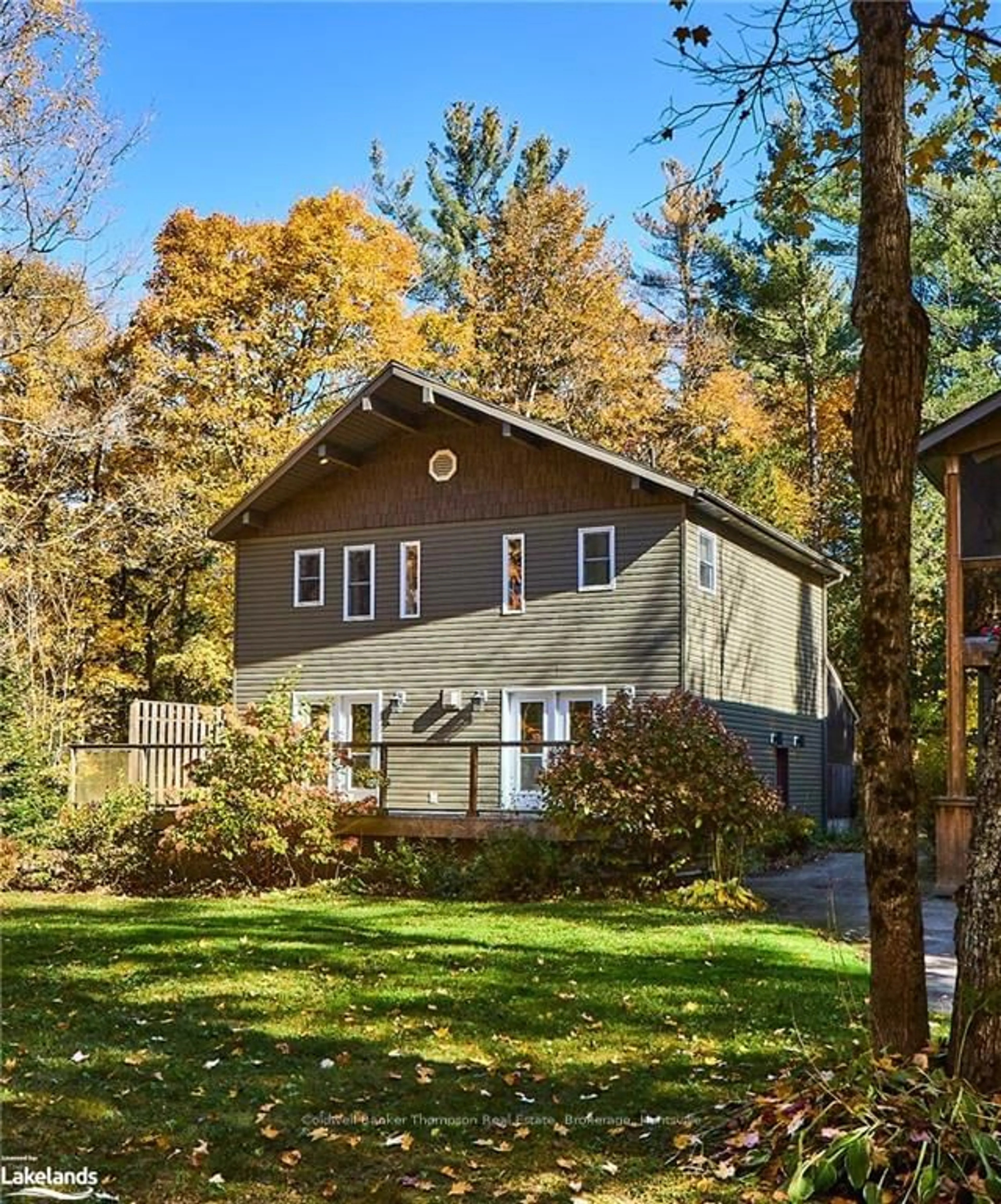 Frontside or backside of a home, cottage for 73 PENNYS Lane, Huntsville Ontario P0B 1M0