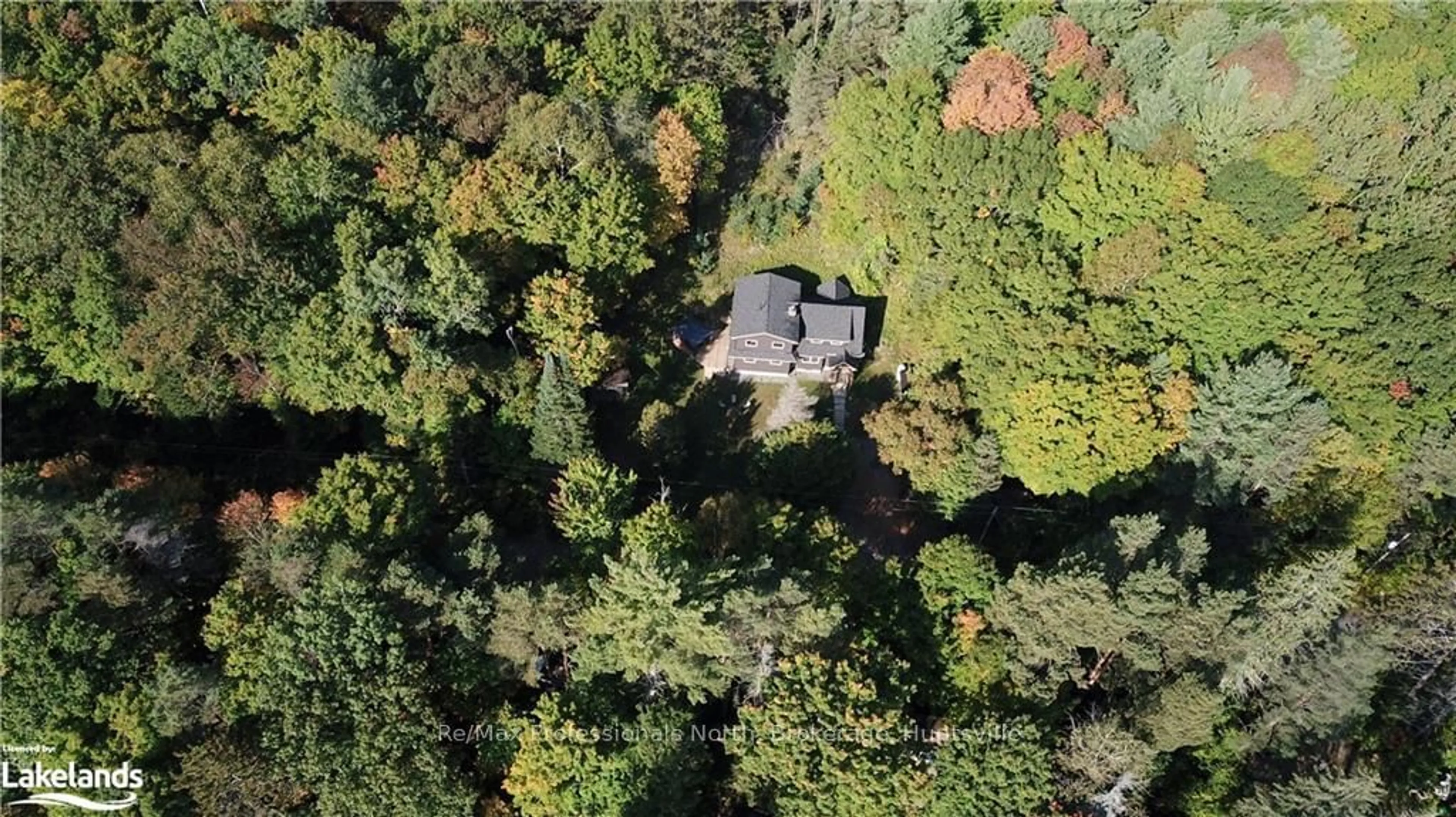 A pic from outside/outdoor area/front of a property/back of a property/a pic from drone, forest/trees view for 1228 RONVILLE Rd, Lake of Bays Ontario P0A 1H0