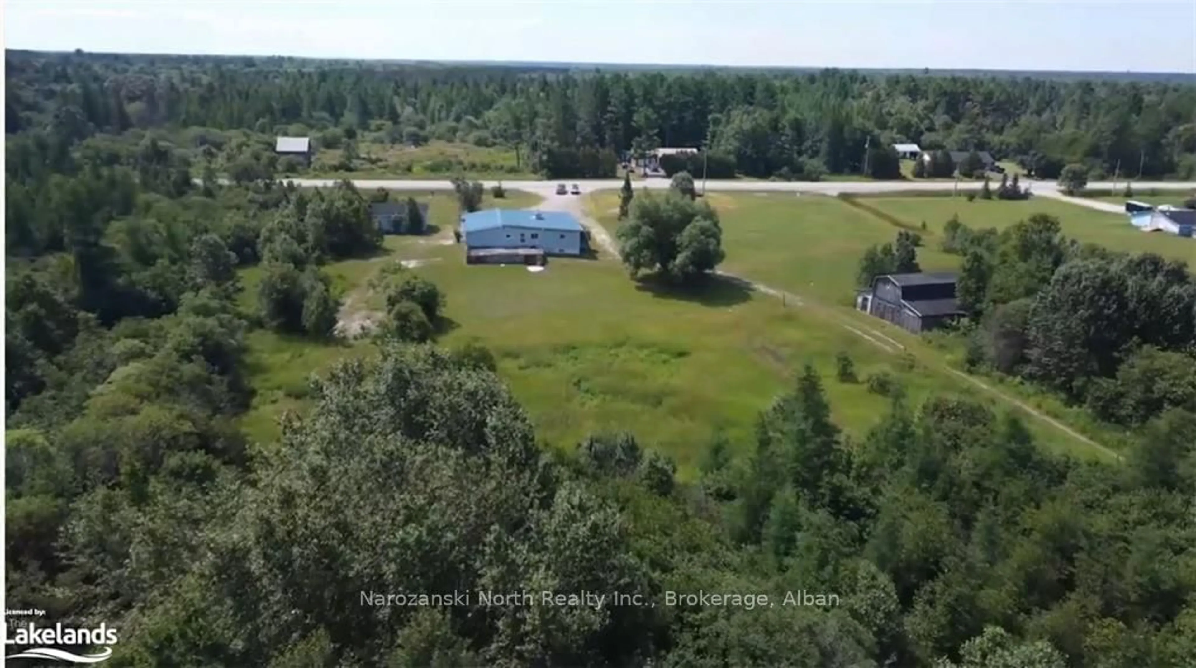 A pic from exterior of the house or condo, the fenced backyard for 2855 64, French River Ontario P0M 2N0