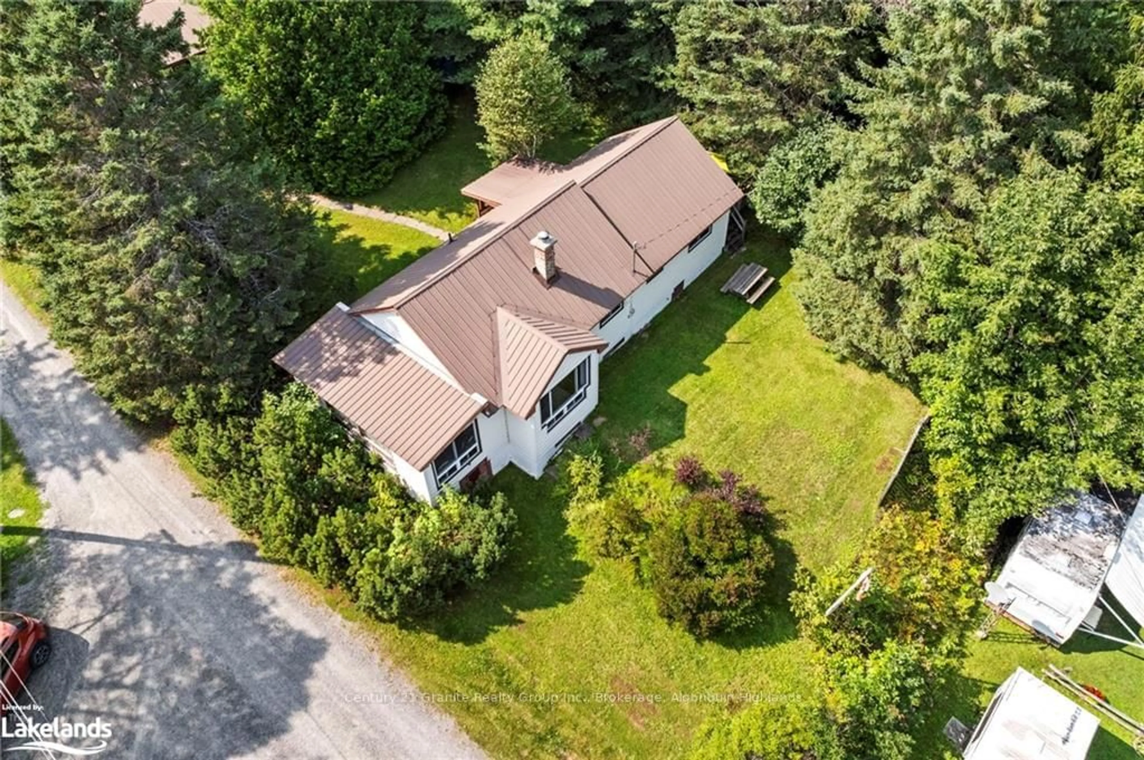 Frontside or backside of a home, cottage for 1017 HARVEST MOON Lane, Algonquin Highlands Ontario K0M 1S0