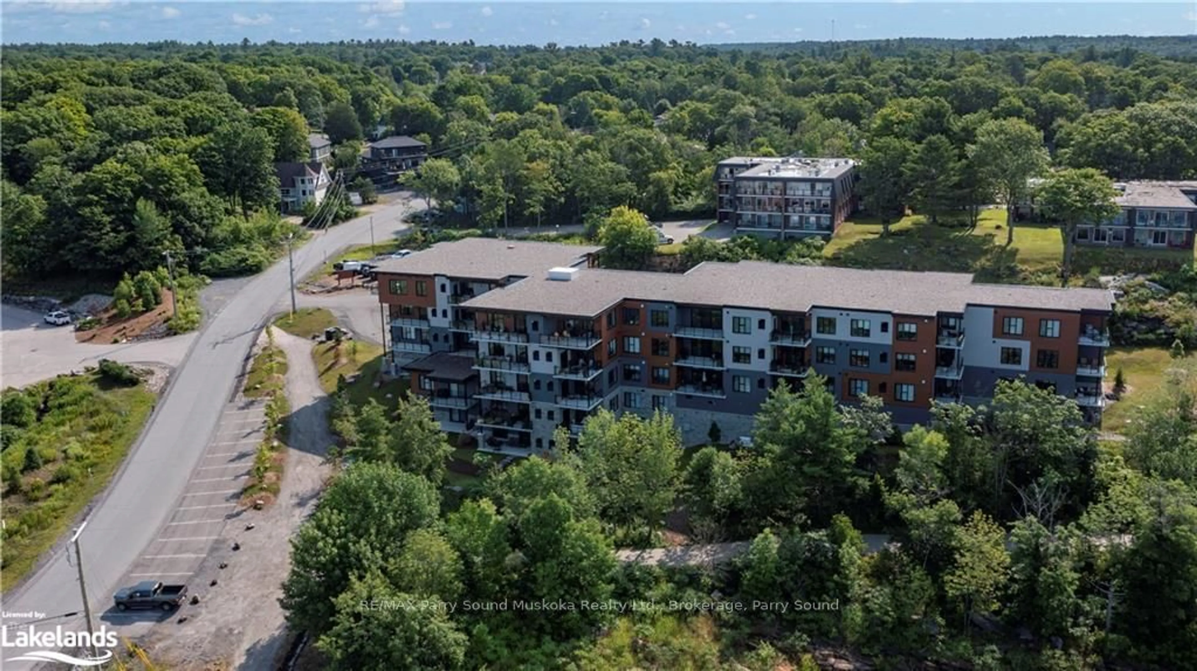 A pic from exterior of the house or condo, the street view for 20 SALT DOCK ROAD #209, Parry Sound Ontario P2A 0E7