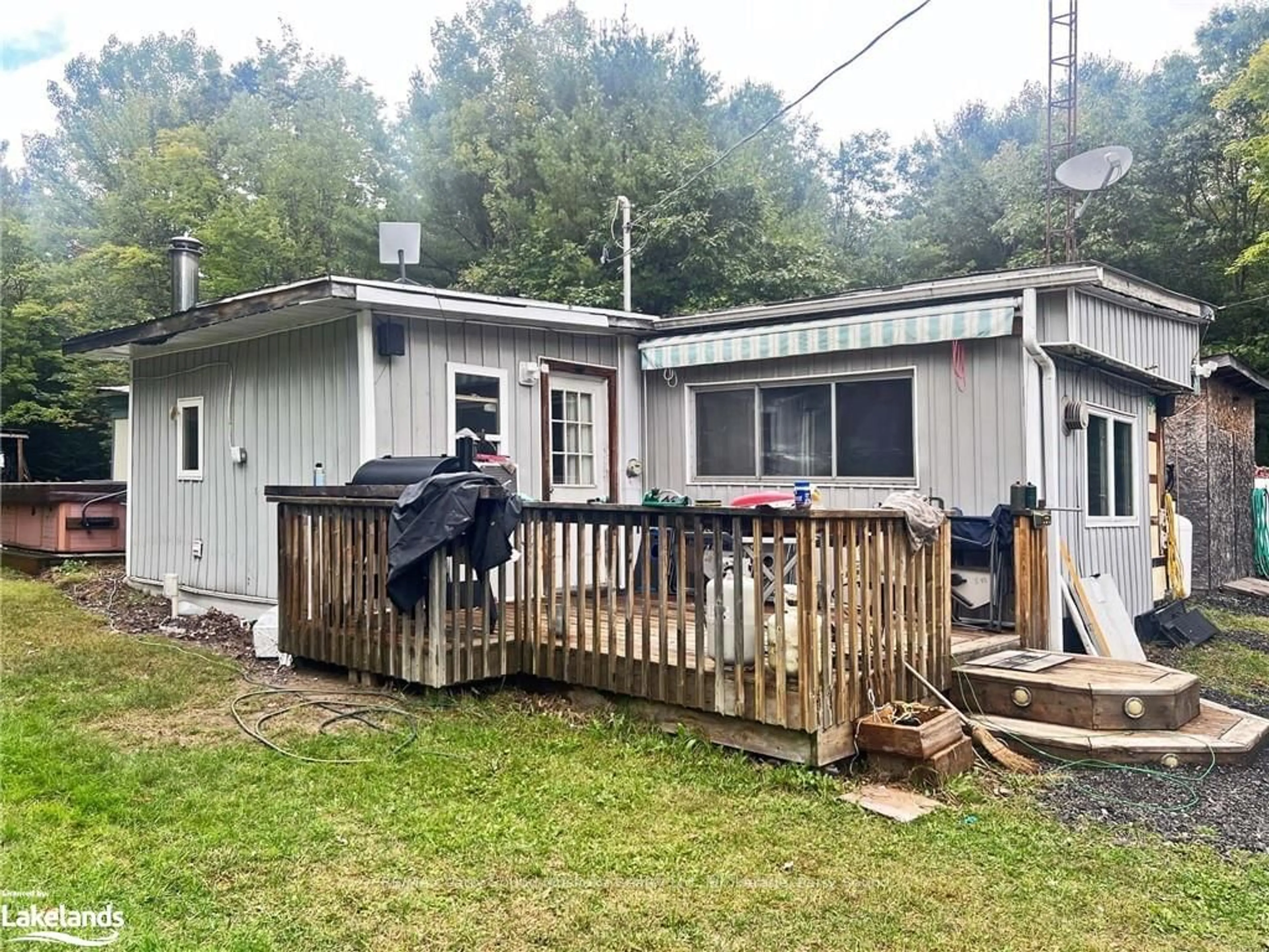 Frontside or backside of a home, the fenced backyard for 278 124, McDougall Ontario P2A 2W7