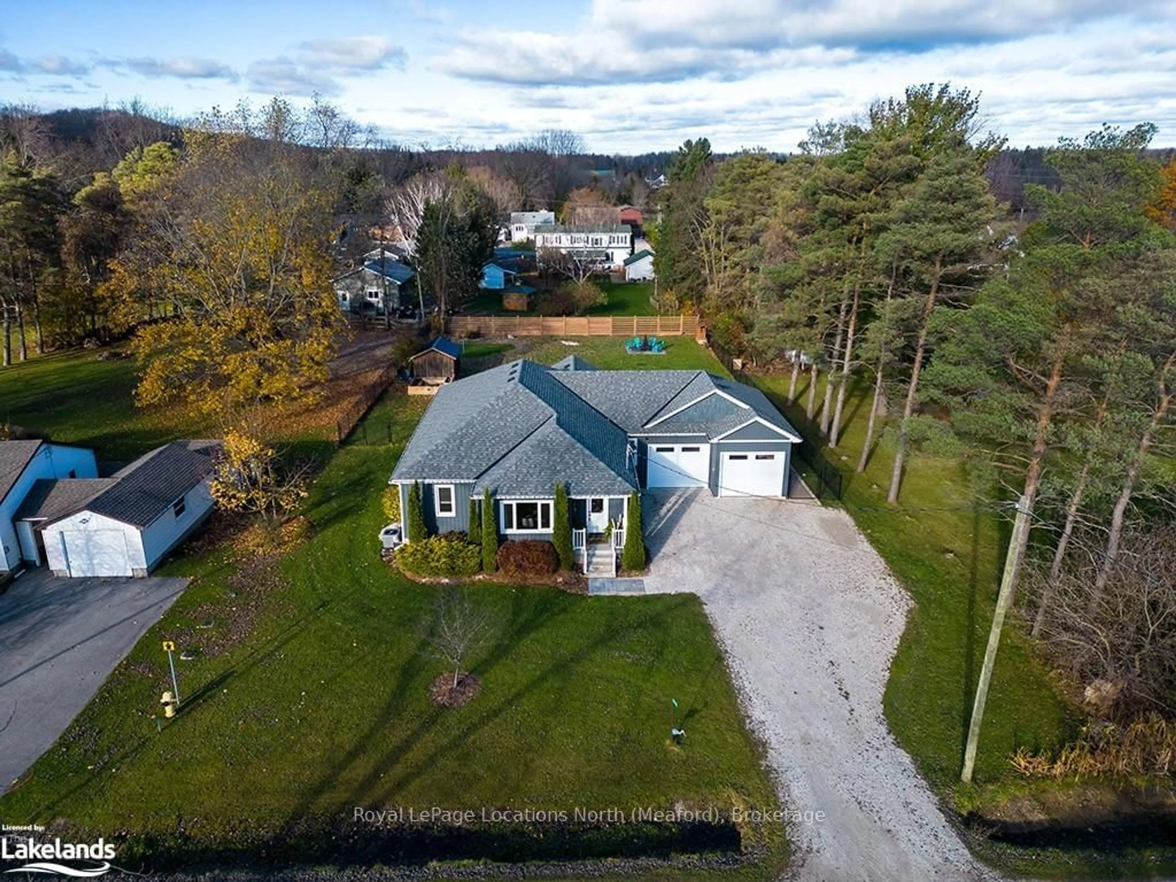 Frontside or backside of a home, cottage for 879 15TH St, Georgian Bluffs Ontario N4X 6V5