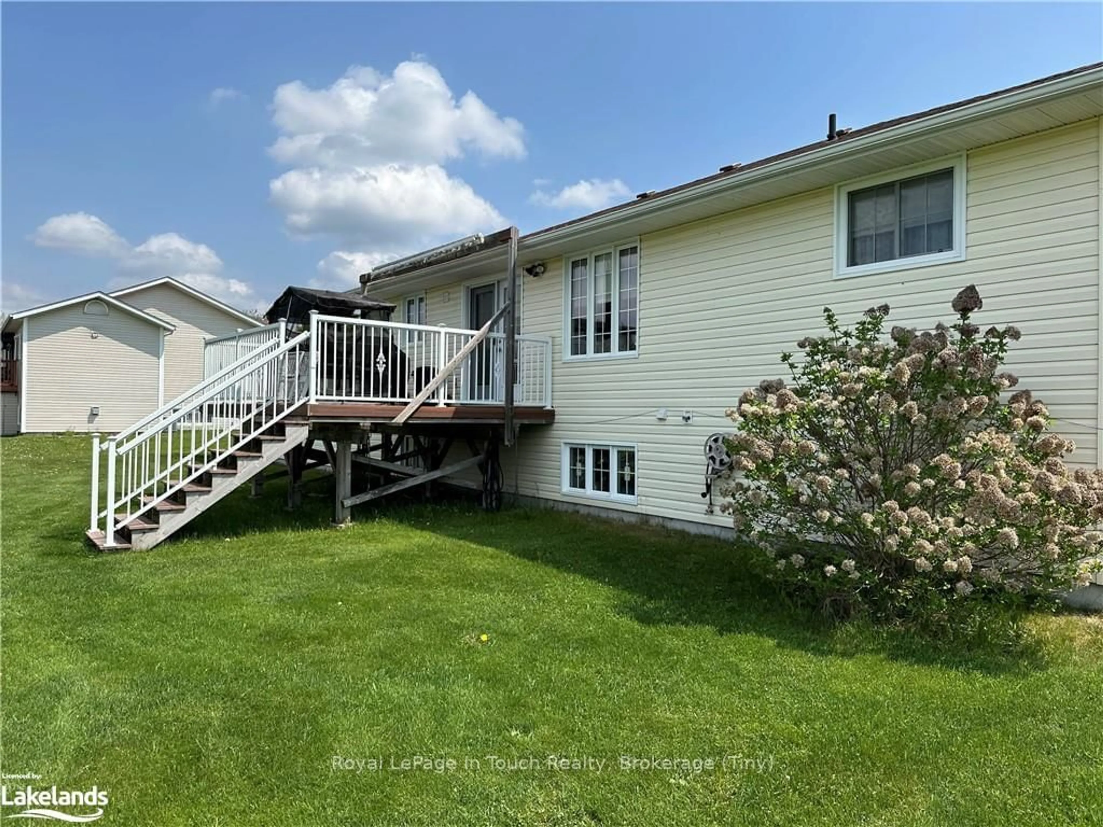 Frontside or backside of a home, the fenced backyard for 37 TAMERACK Ave, Nipissing Ontario P2B 3H3