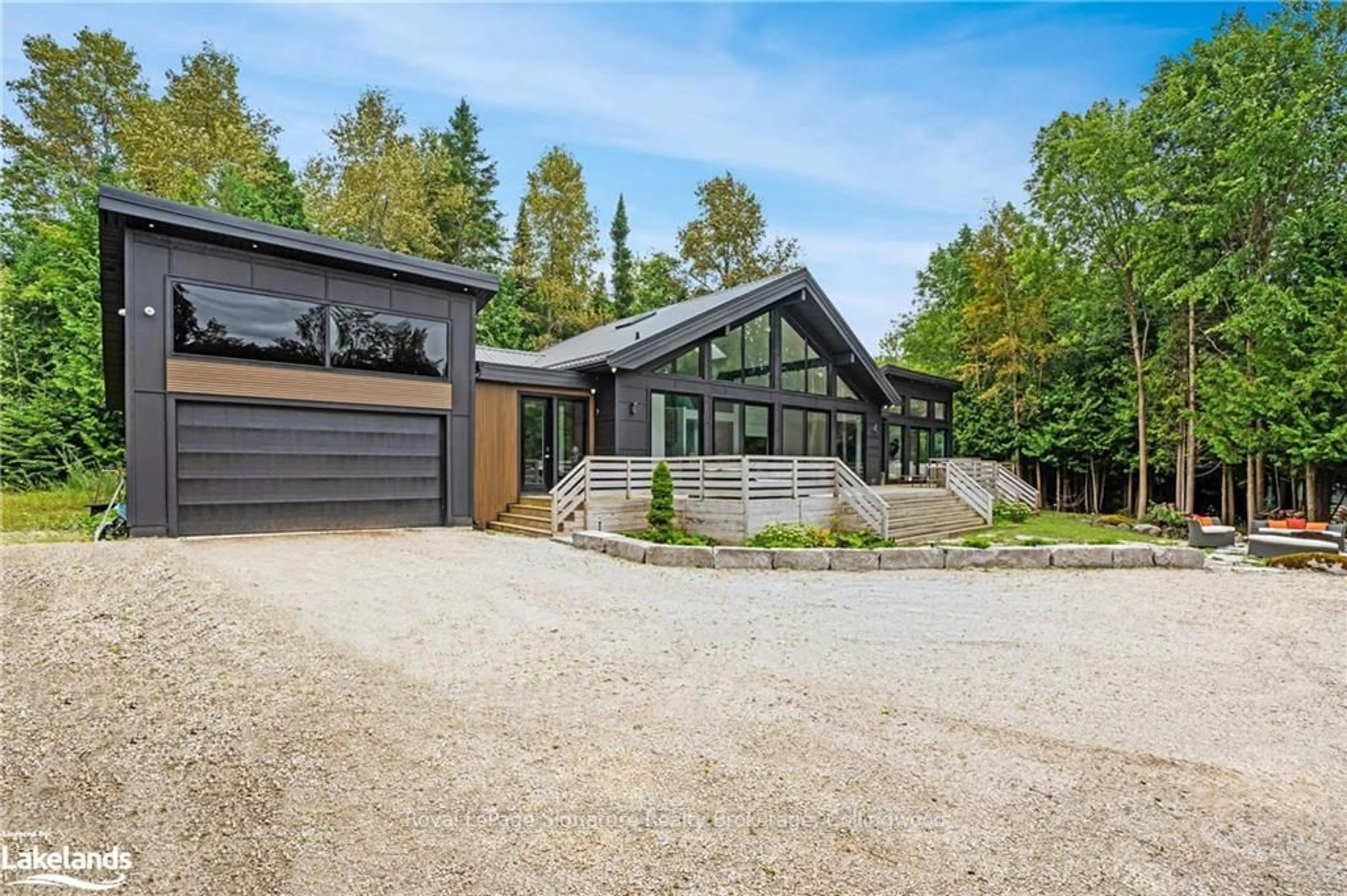 Frontside or backside of a home, cottage for 415040 10TH Line, Blue Mountains Ontario N0H 2E0