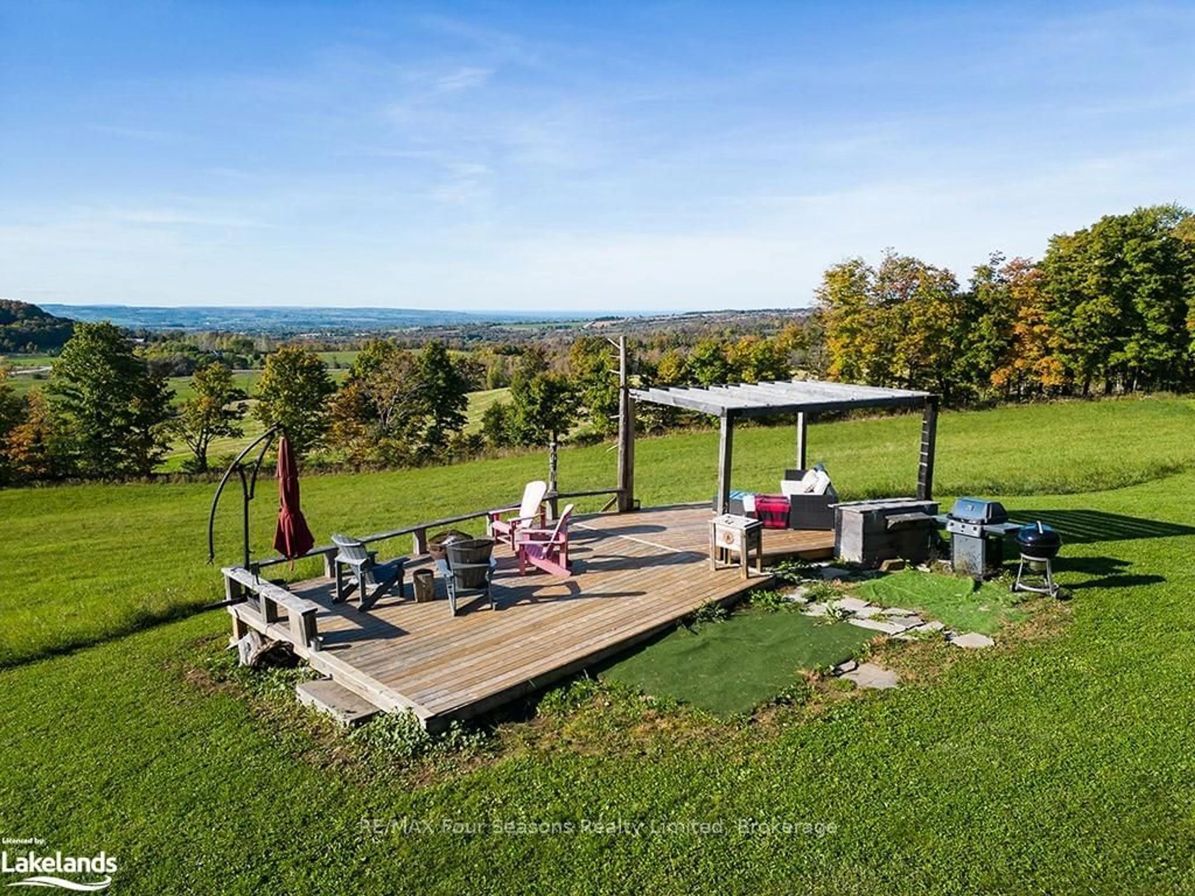 Patio, the fenced backyard for 495529 2 GREY Rd, Blue Mountains Ontario N0H 2E0