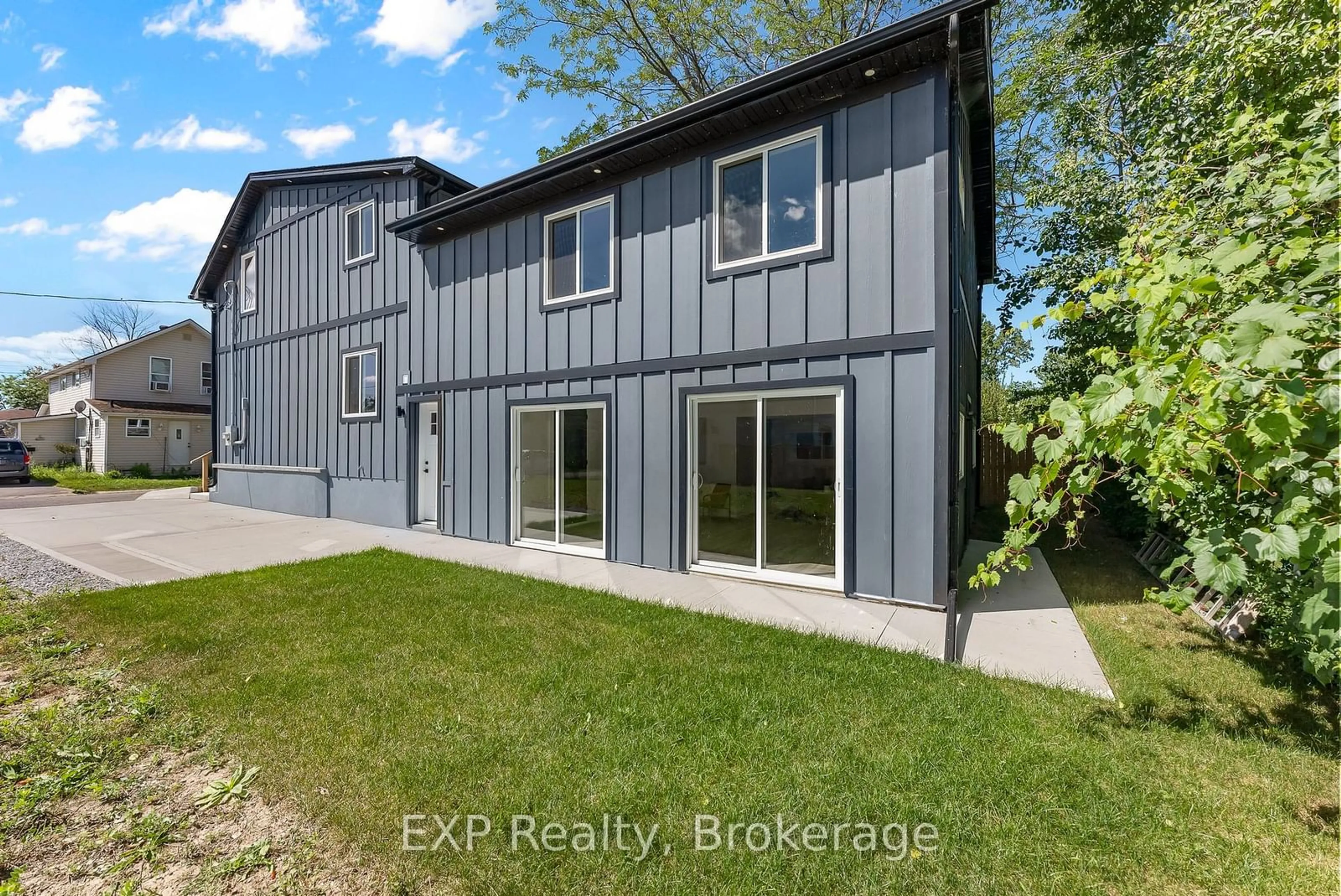 Frontside or backside of a home, the fenced backyard for 40 Parkview Ave, Fort Erie Ontario L2A 5L7