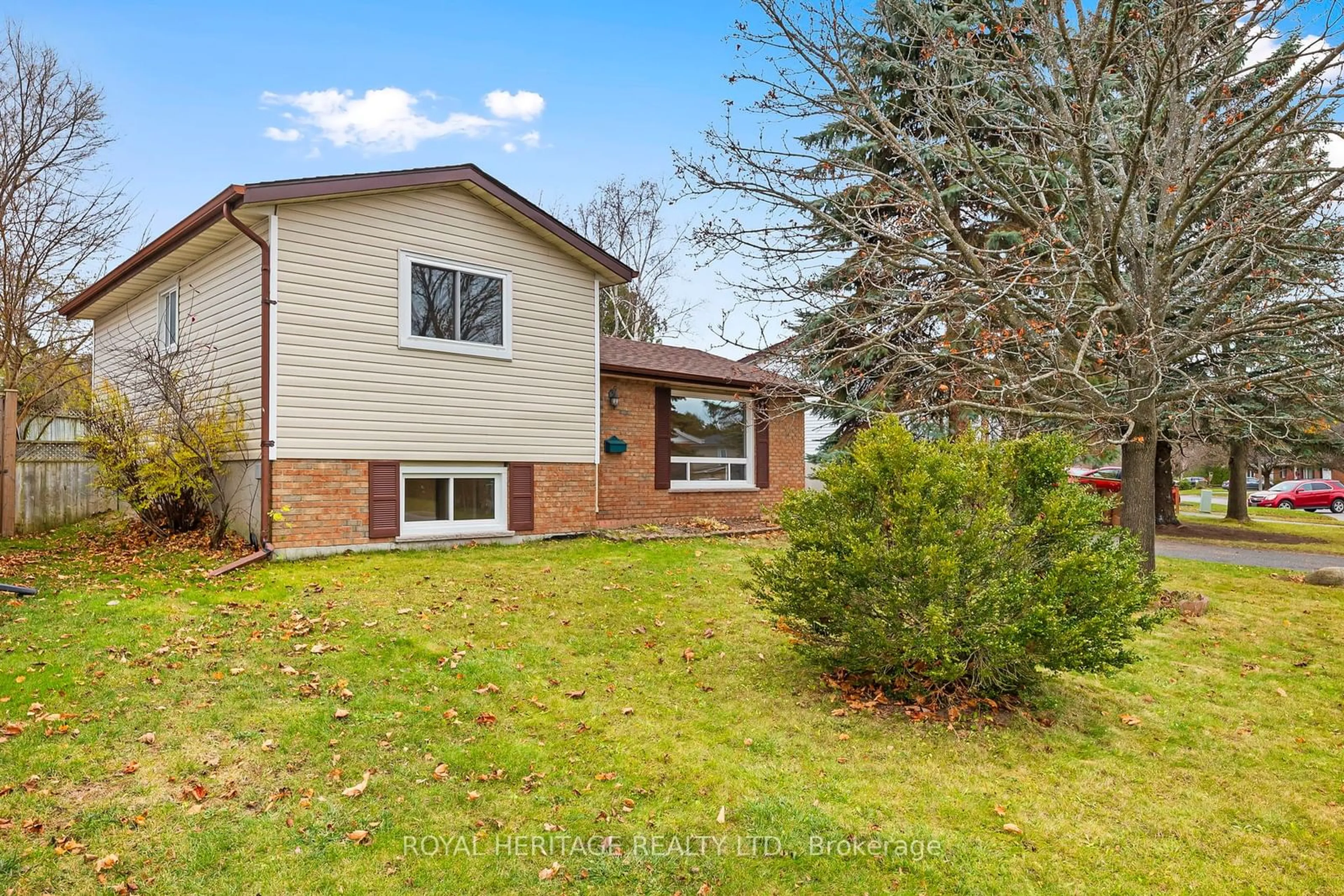 Frontside or backside of a home, the fenced backyard for 1569 Redwood Dr, Peterborough Ontario K9K 1N9