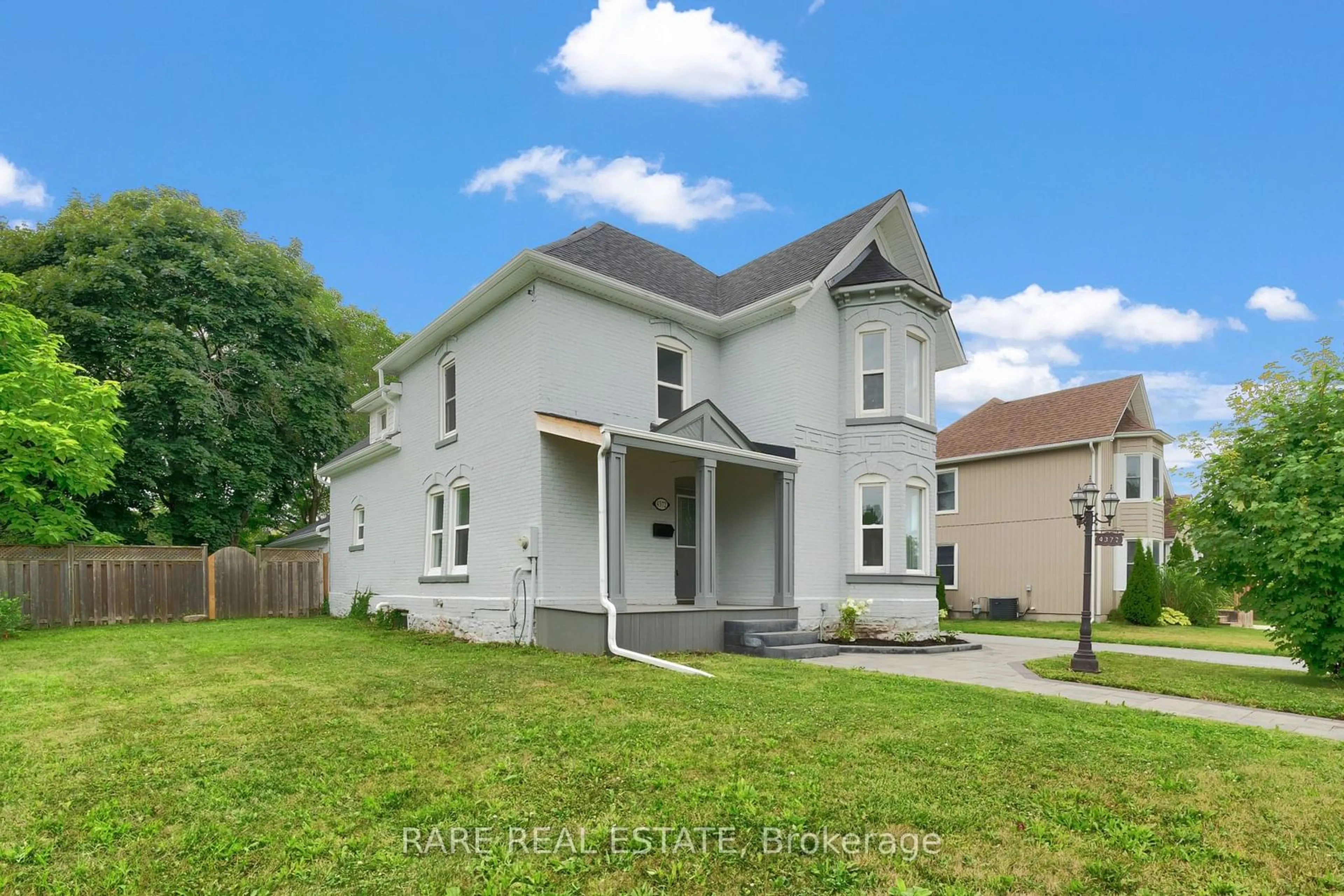 Frontside or backside of a home, the fenced backyard for 4372 Ontario St, Lincoln Ontario L0R 1B0