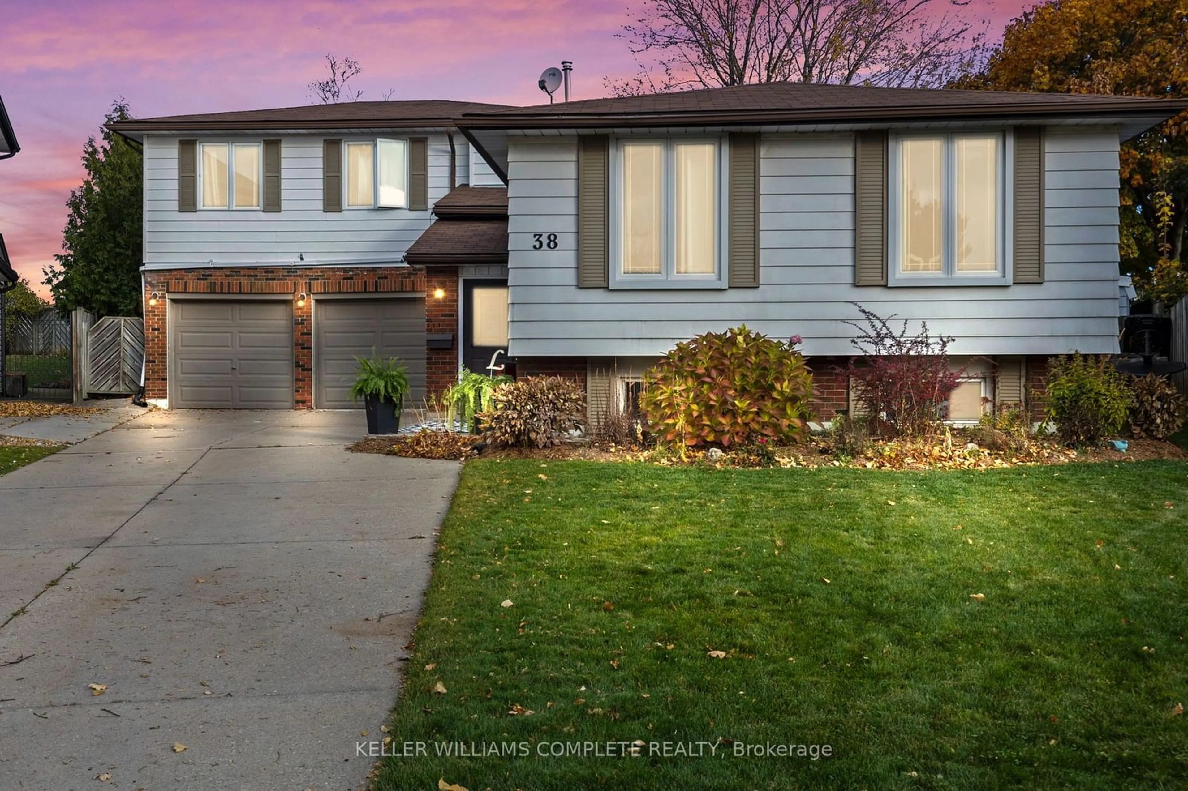 Frontside or backside of a home, the fenced backyard for 38 BRETT Crt, Hamilton Ontario L8T 4R8