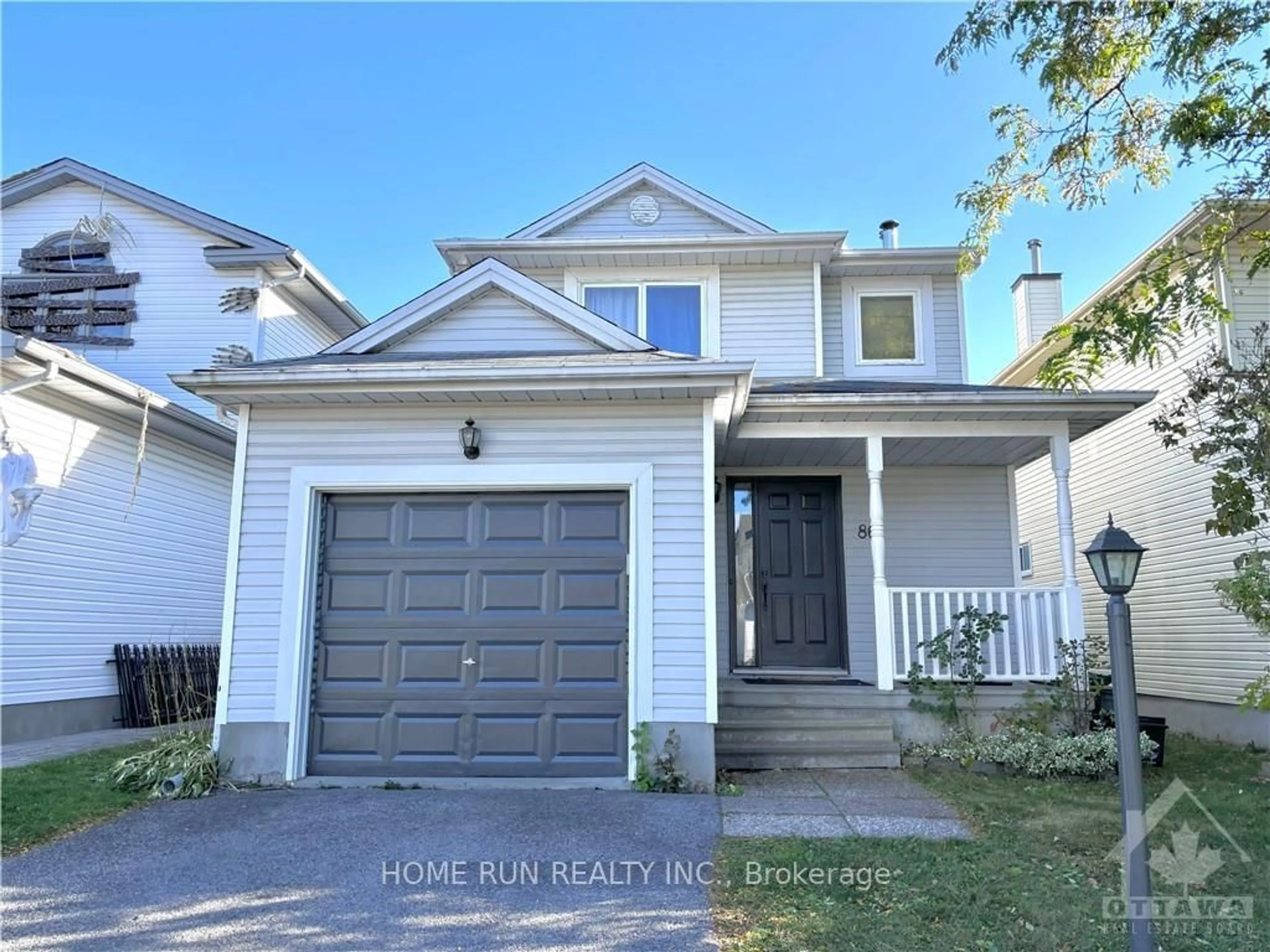 Frontside or backside of a home, the street view for 86 PEACOCK Cres, Barrhaven Ontario K2J 3N7