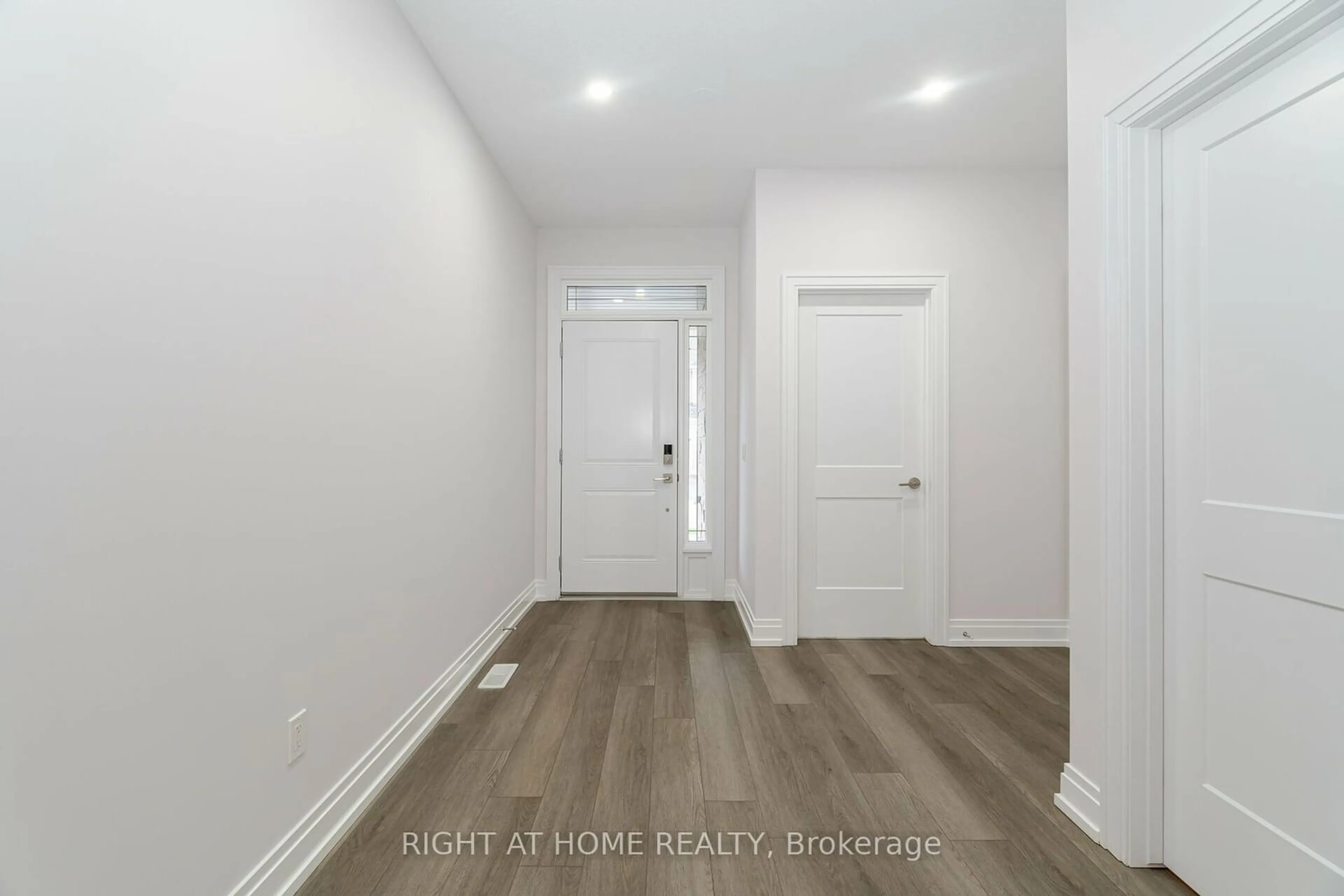 A pic of a room, wood floors for 30 Granite Ridge Tr, Hamilton Ontario L8B 1Y4