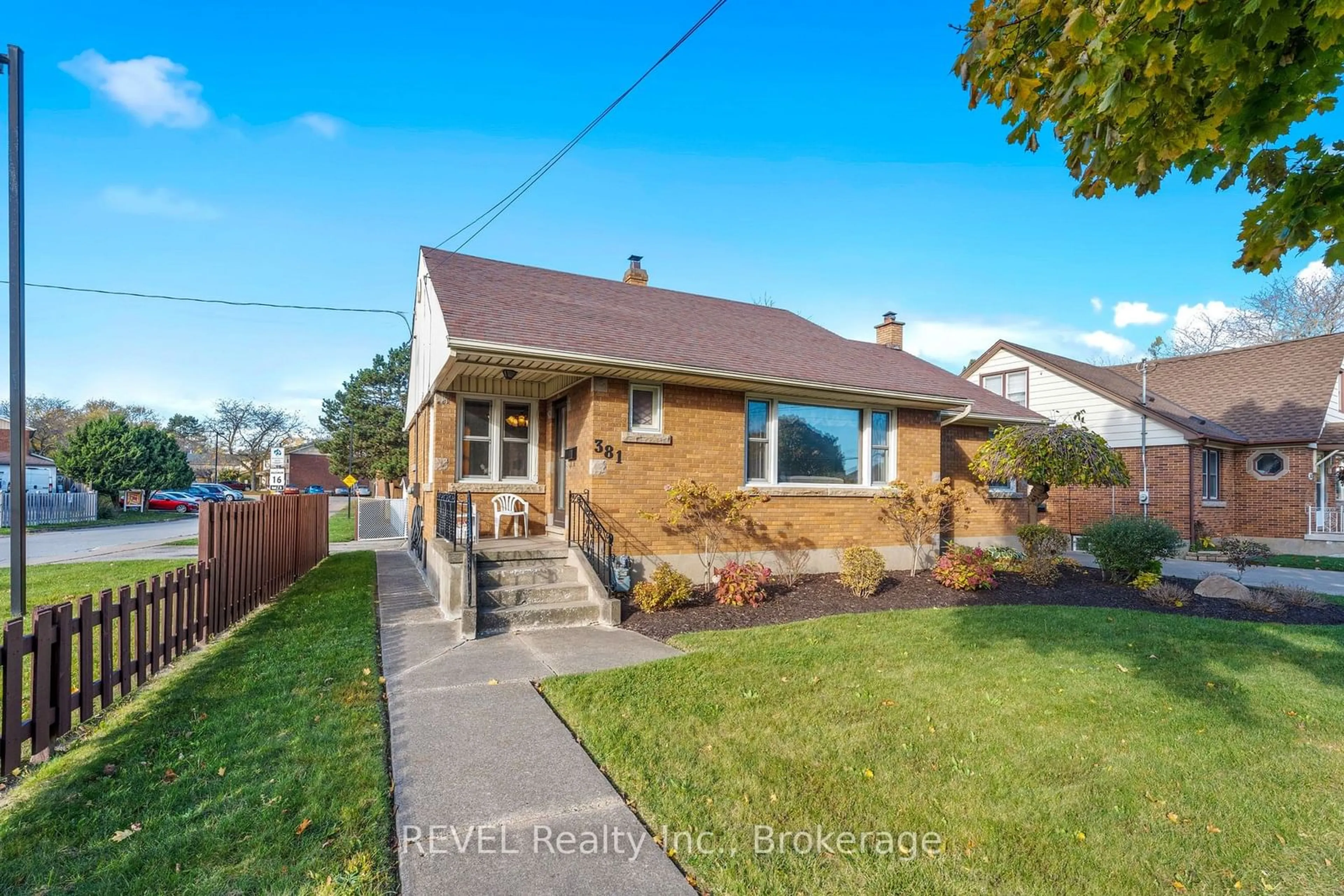 Frontside or backside of a home, the fenced backyard for 381 Niagara St, St. Catharines Ontario L2M 4V9