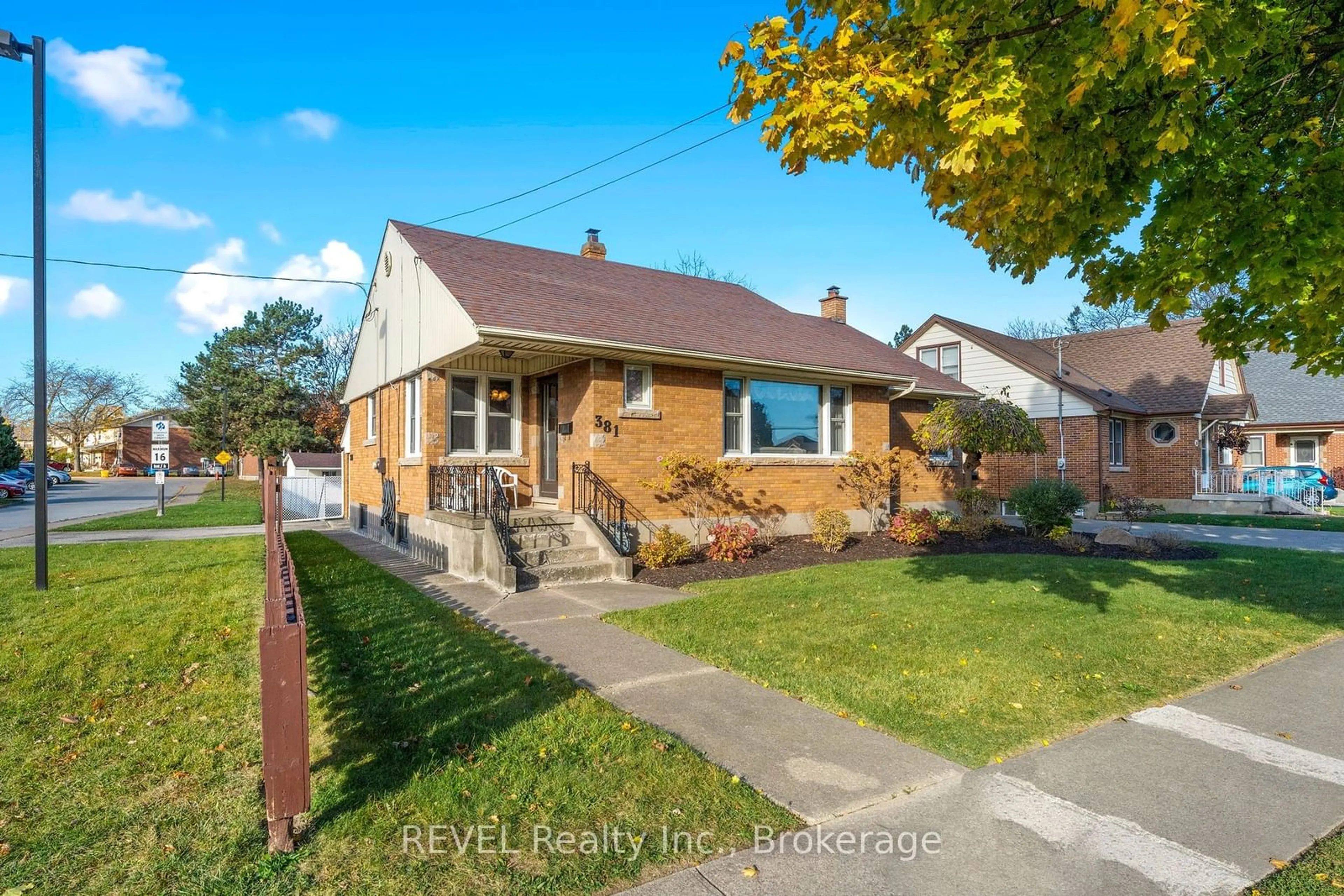 Frontside or backside of a home, the fenced backyard for 381 Niagara St, St. Catharines Ontario L2M 4V9