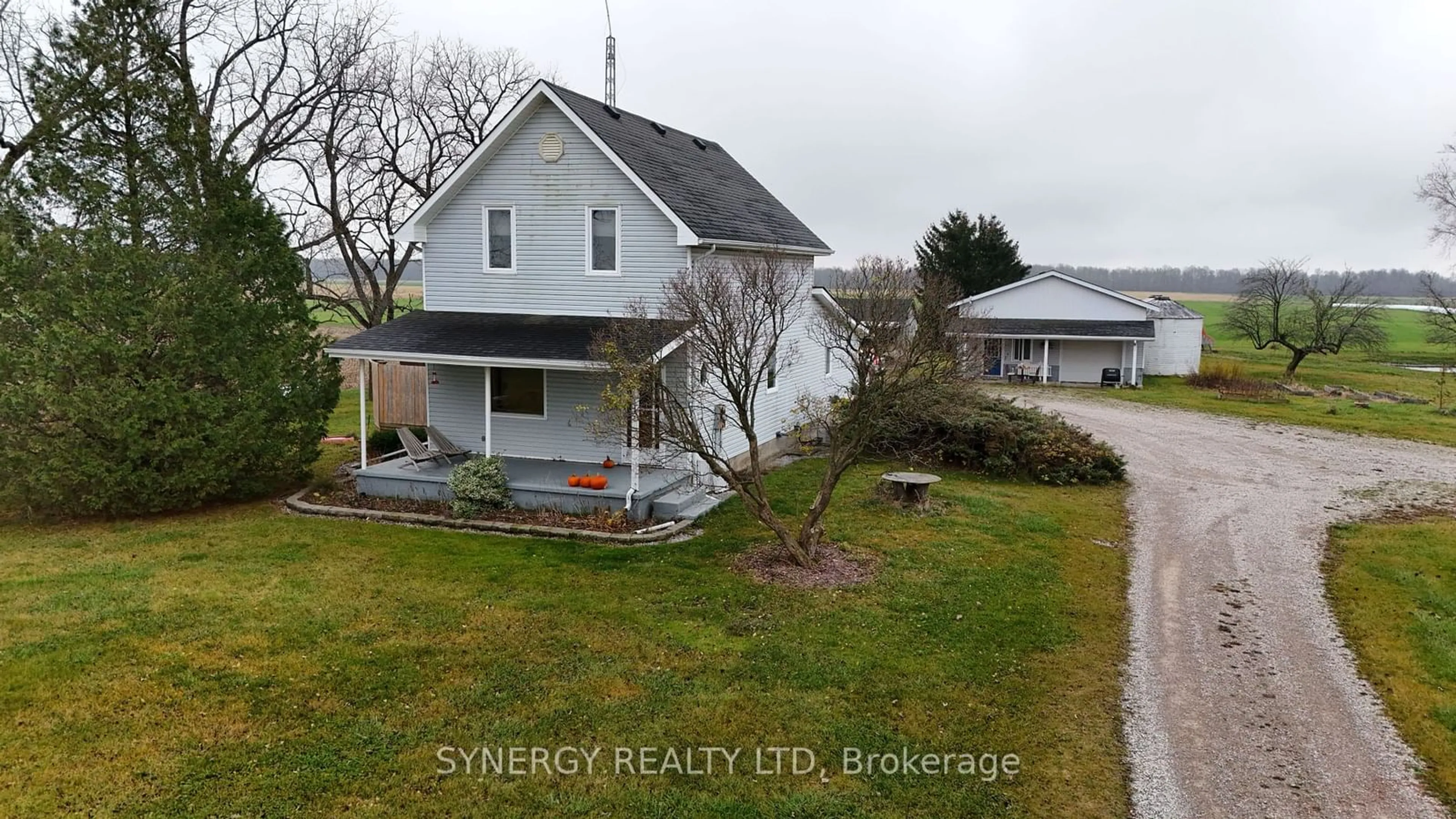 Frontside or backside of a home, the fenced backyard for 5819 London Line, Plympton-Wyoming Ontario N0N 1T0