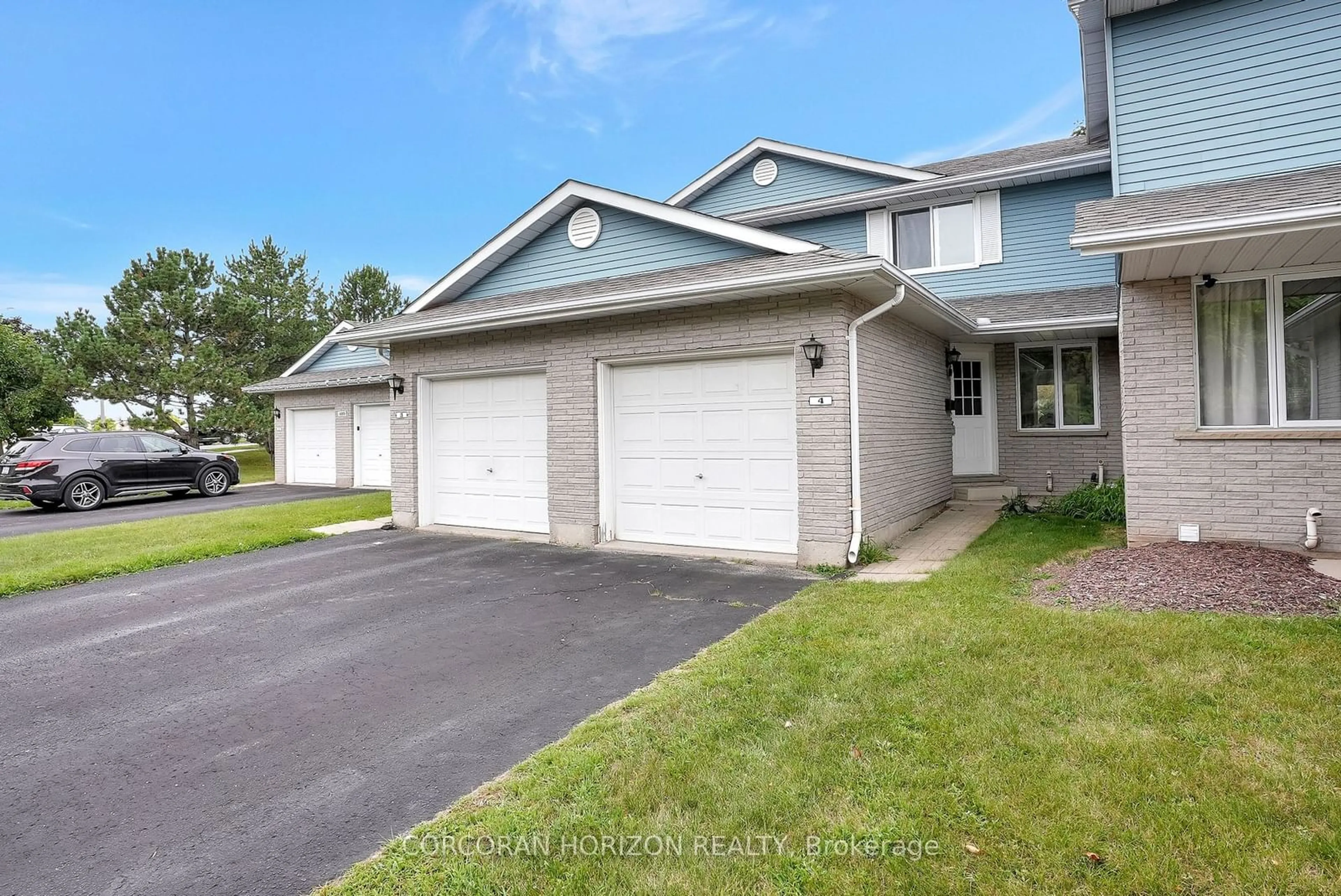 A pic from exterior of the house or condo, the street view for 405 Kingscourt Dr #4, Waterloo Ontario N2K 3R4