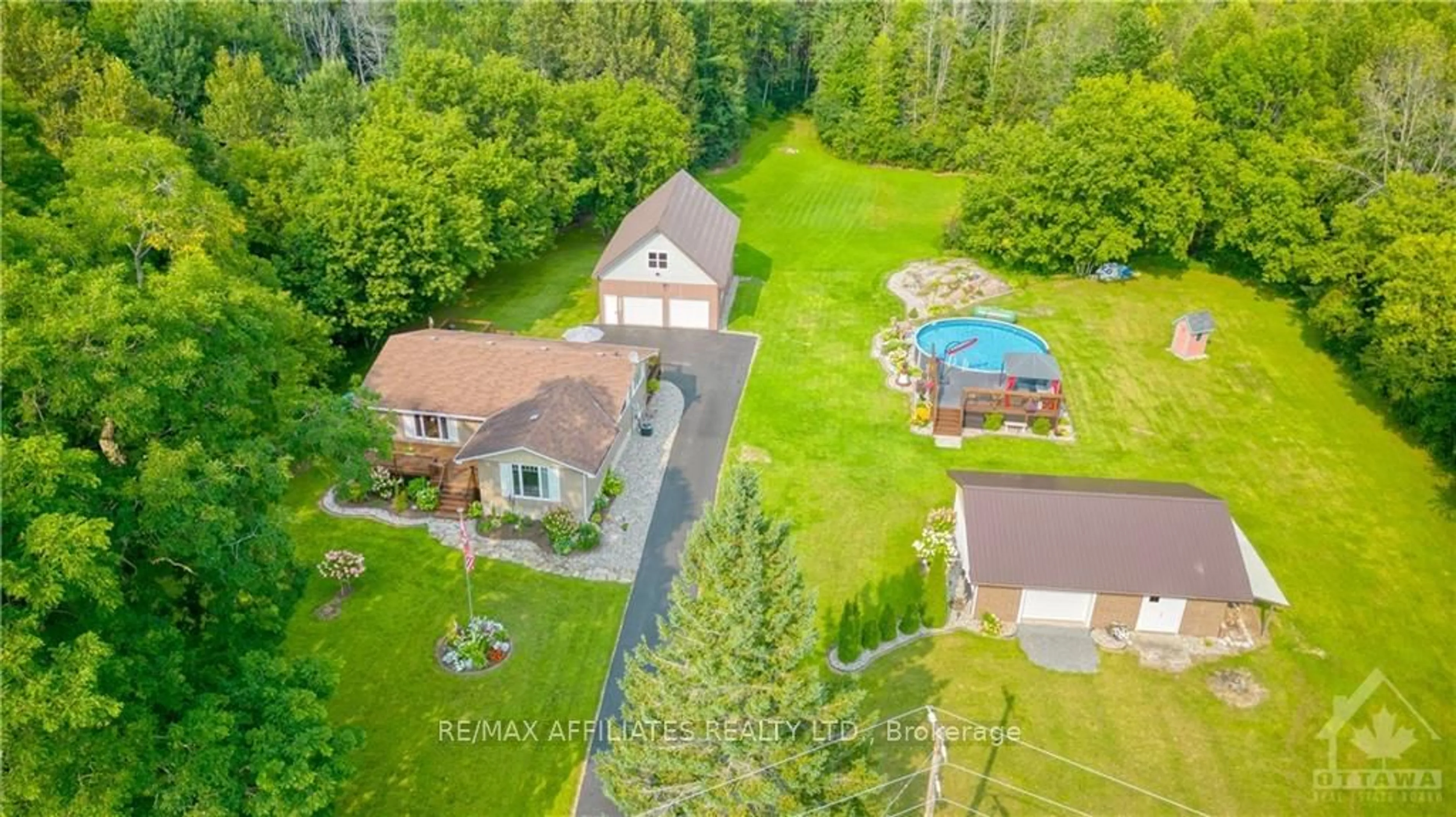 Frontside or backside of a home, the fenced backyard for 157 PERTH St, Rideau Lakes Ontario K0G 1E0