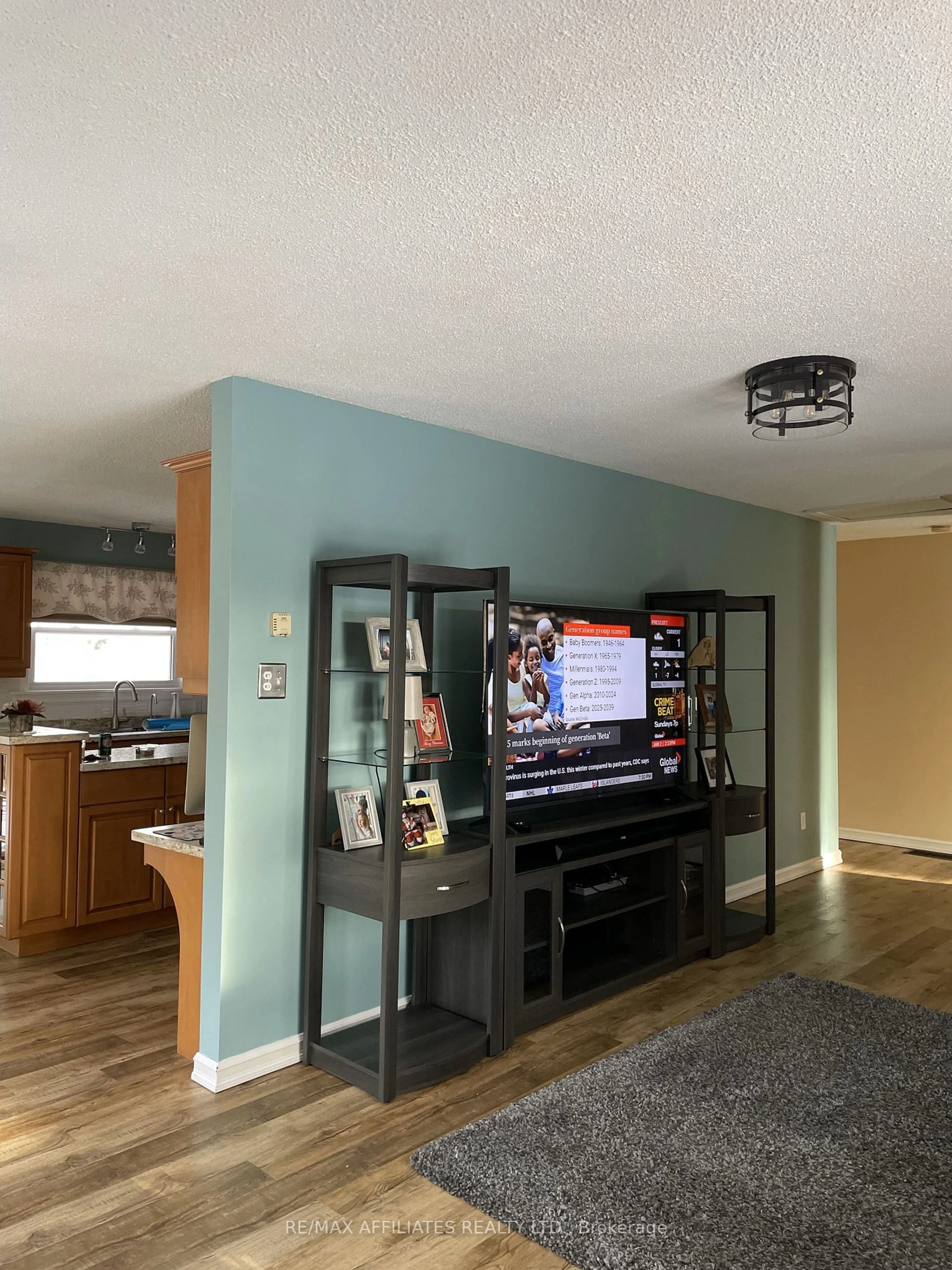 Living room with furniture, wood/laminate floor for 157 PERTH St, Rideau Lakes Ontario K0G 1E0