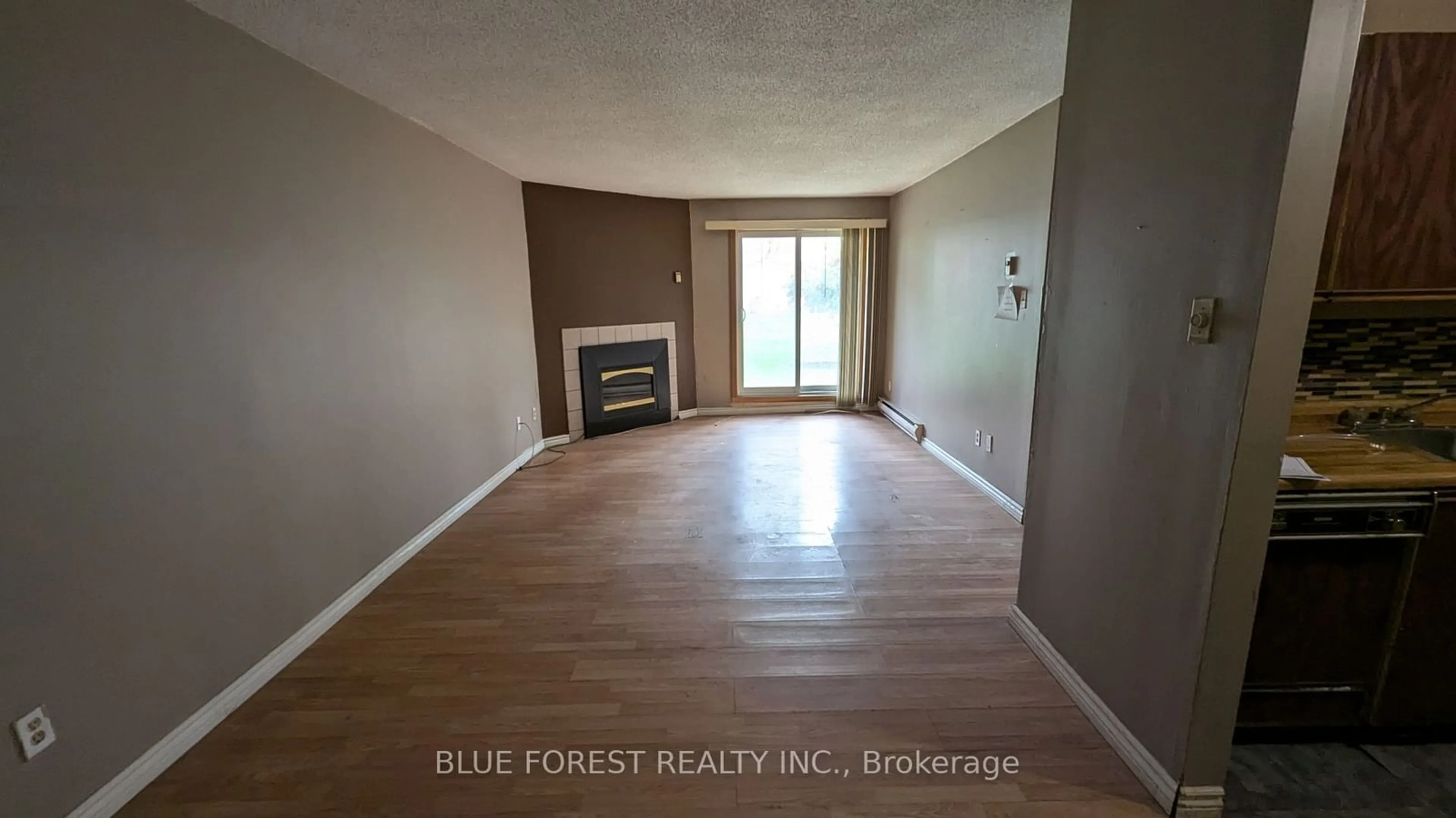 A pic of a room, wood floors for 140 CONWAY Dr #8, London Ontario N6E 3N2