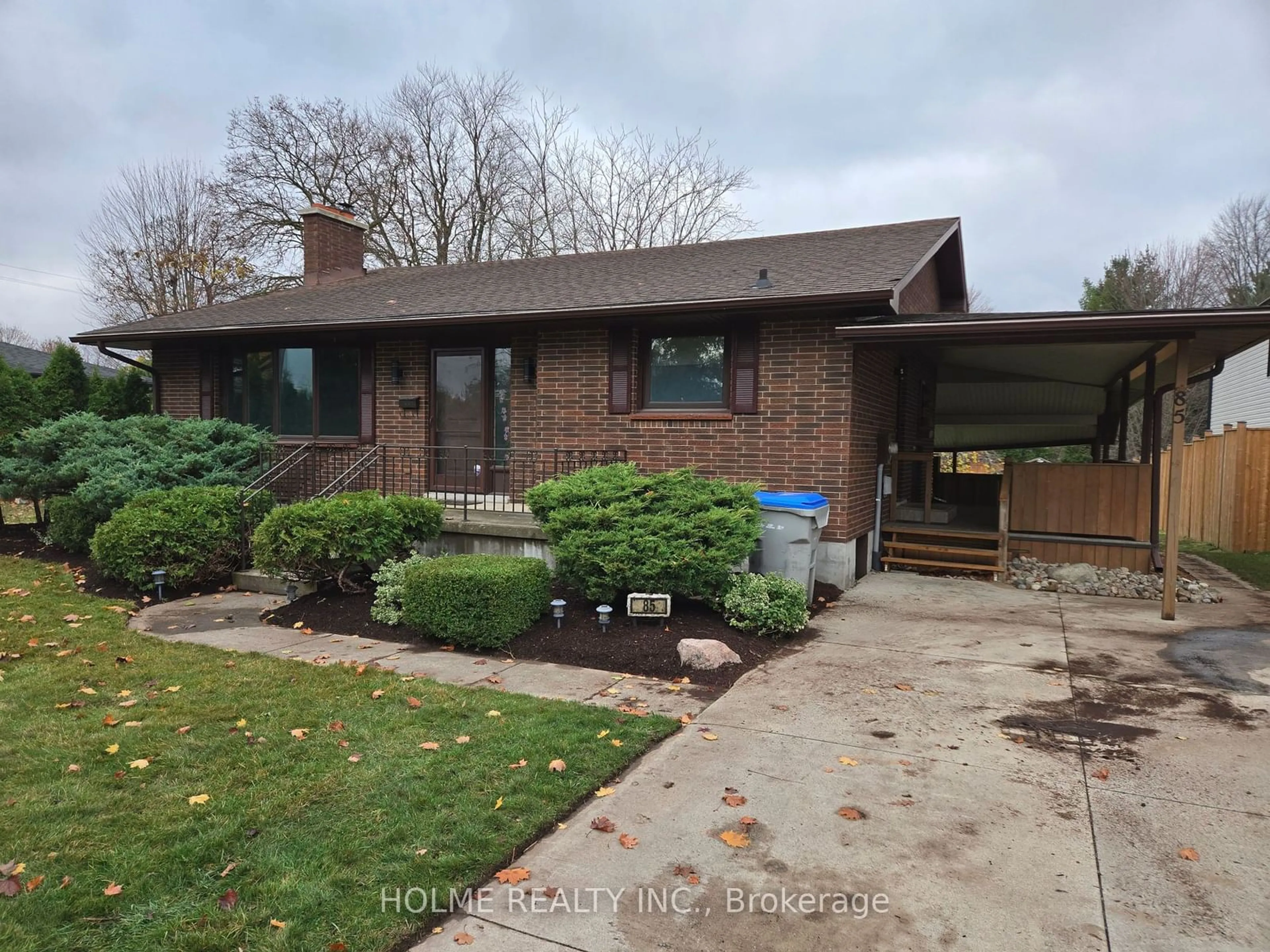 Frontside or backside of a home, the fenced backyard for 85 Erie St, Strathroy-Caradoc Ontario N7G 3P5