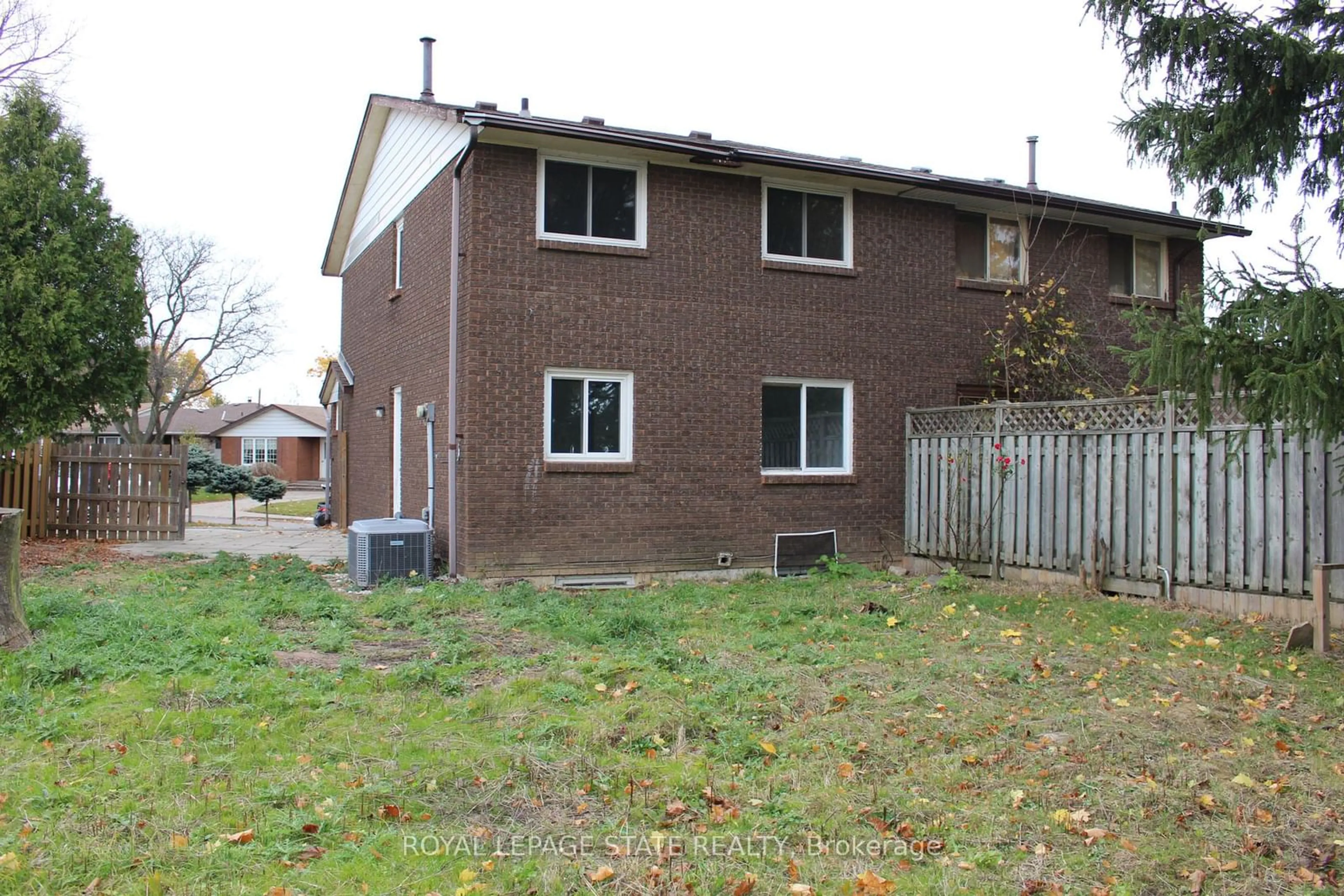 A pic from exterior of the house or condo, the fenced backyard for 23 Horning Dr, Hamilton Ontario L9C 6L2