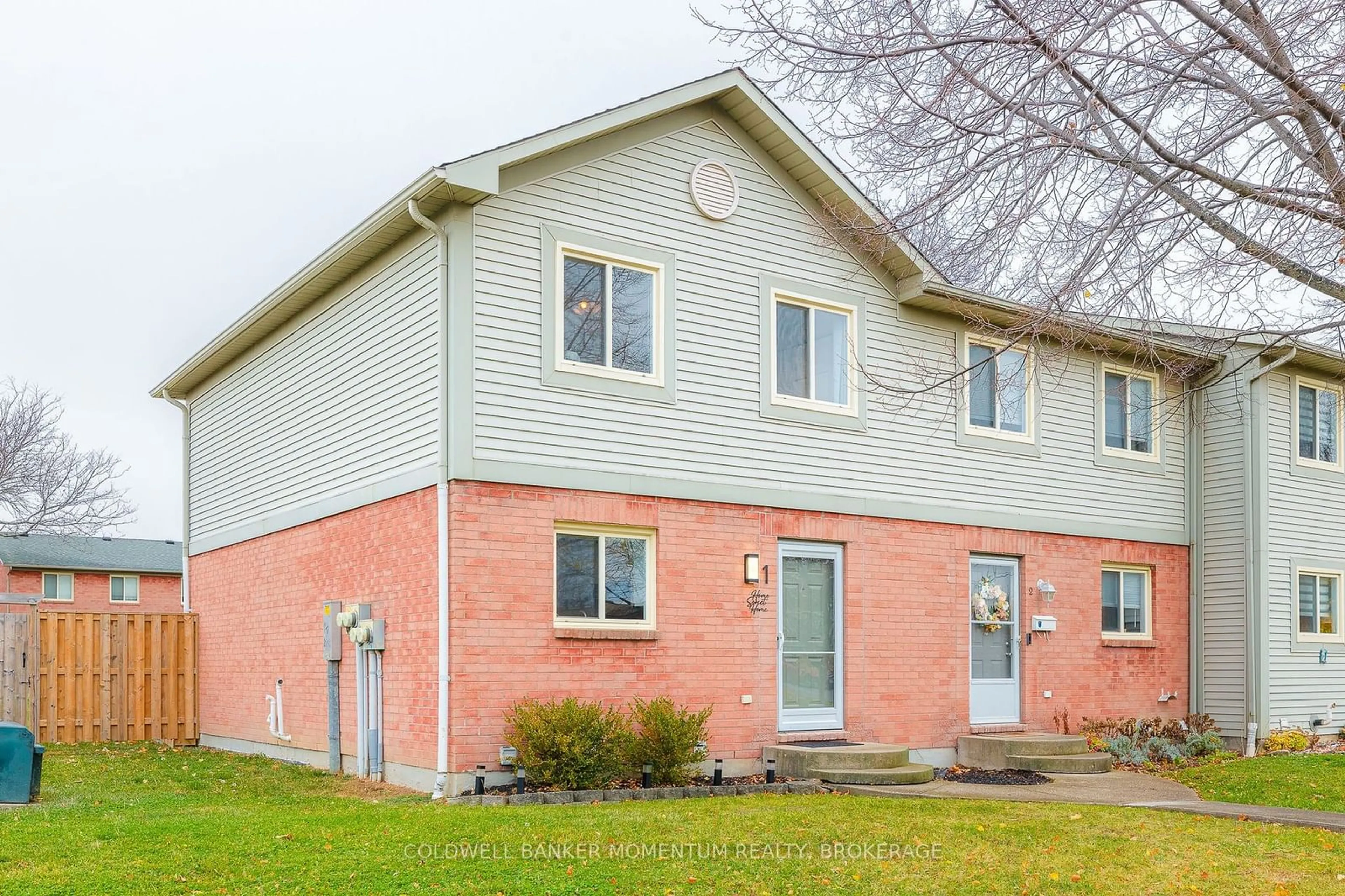 A pic from exterior of the house or condo, the front or back of building for 65 Dorchester Blvd #1, St. Catharines Ontario L2M 7S9