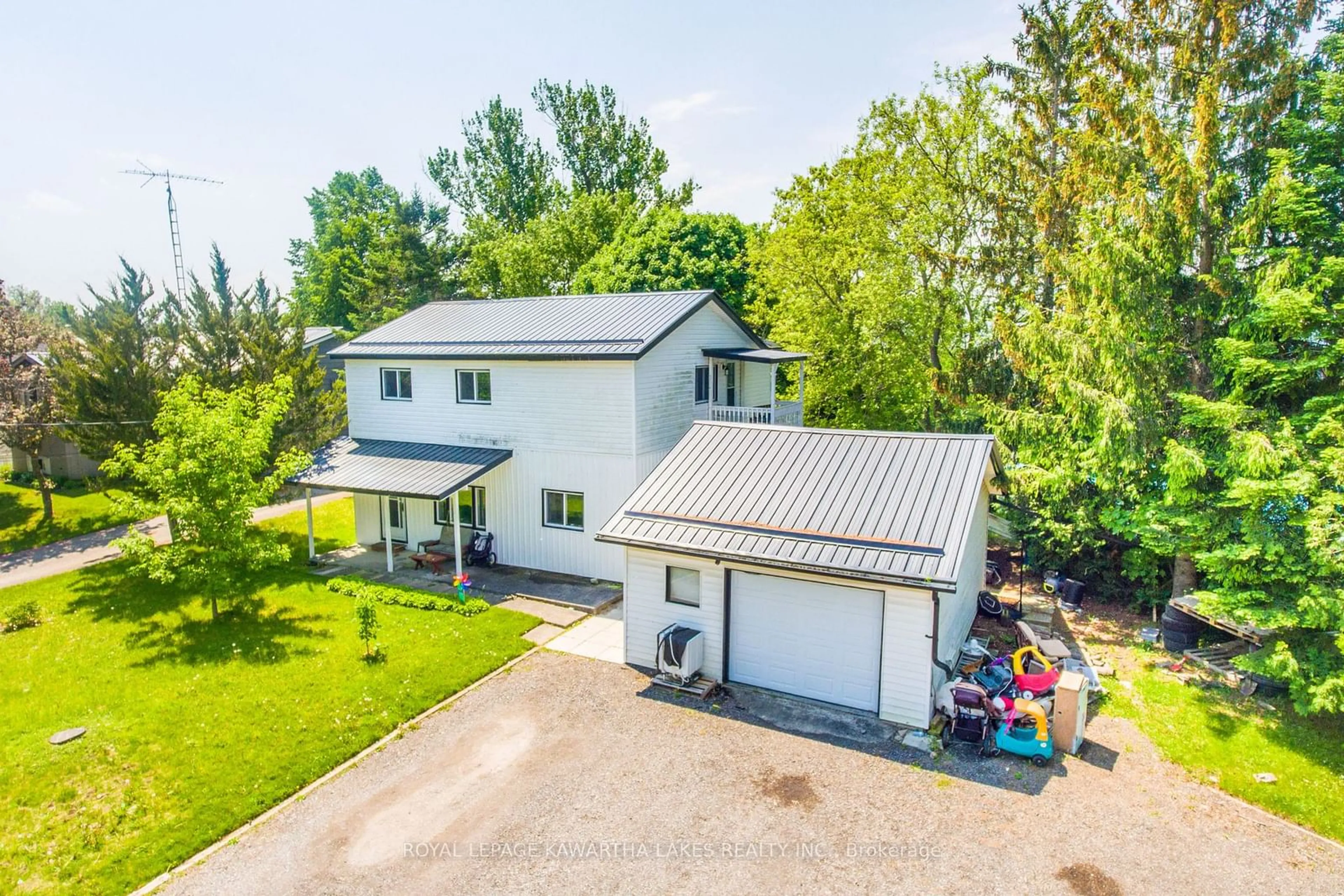 Frontside or backside of a home, cottage for 13 Eva St, Kawartha Lakes Ontario K0M 1N0