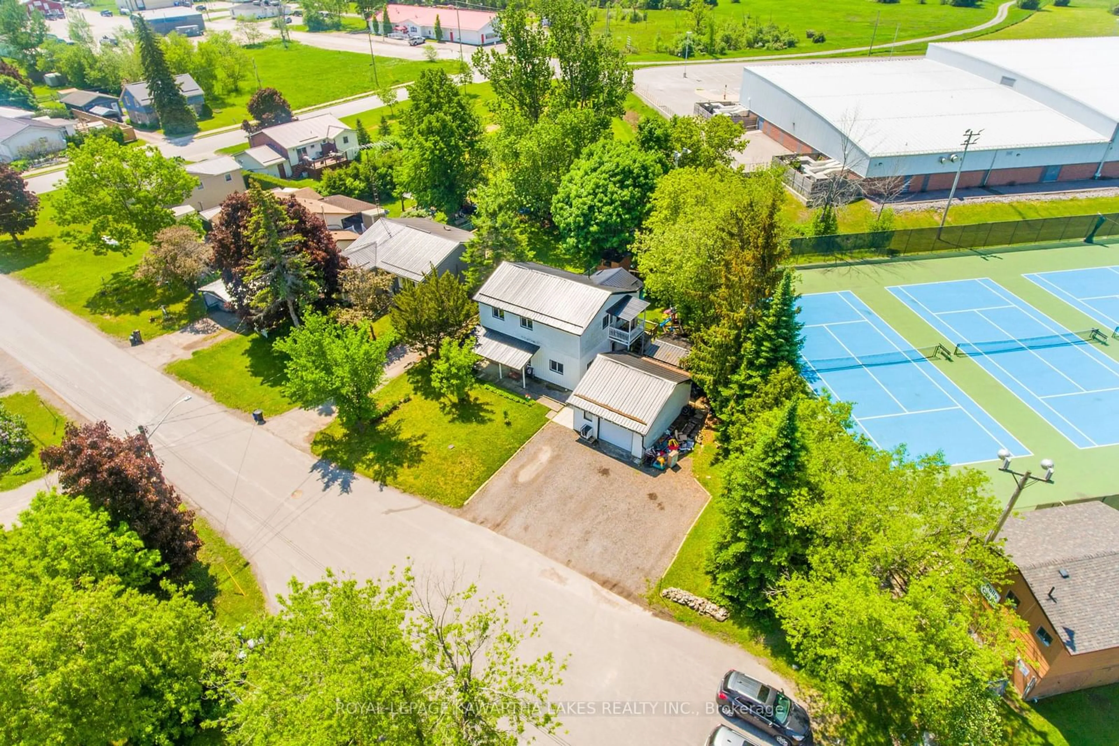 Frontside or backside of a home, the street view for 13 Eva St, Kawartha Lakes Ontario K0M 1N0