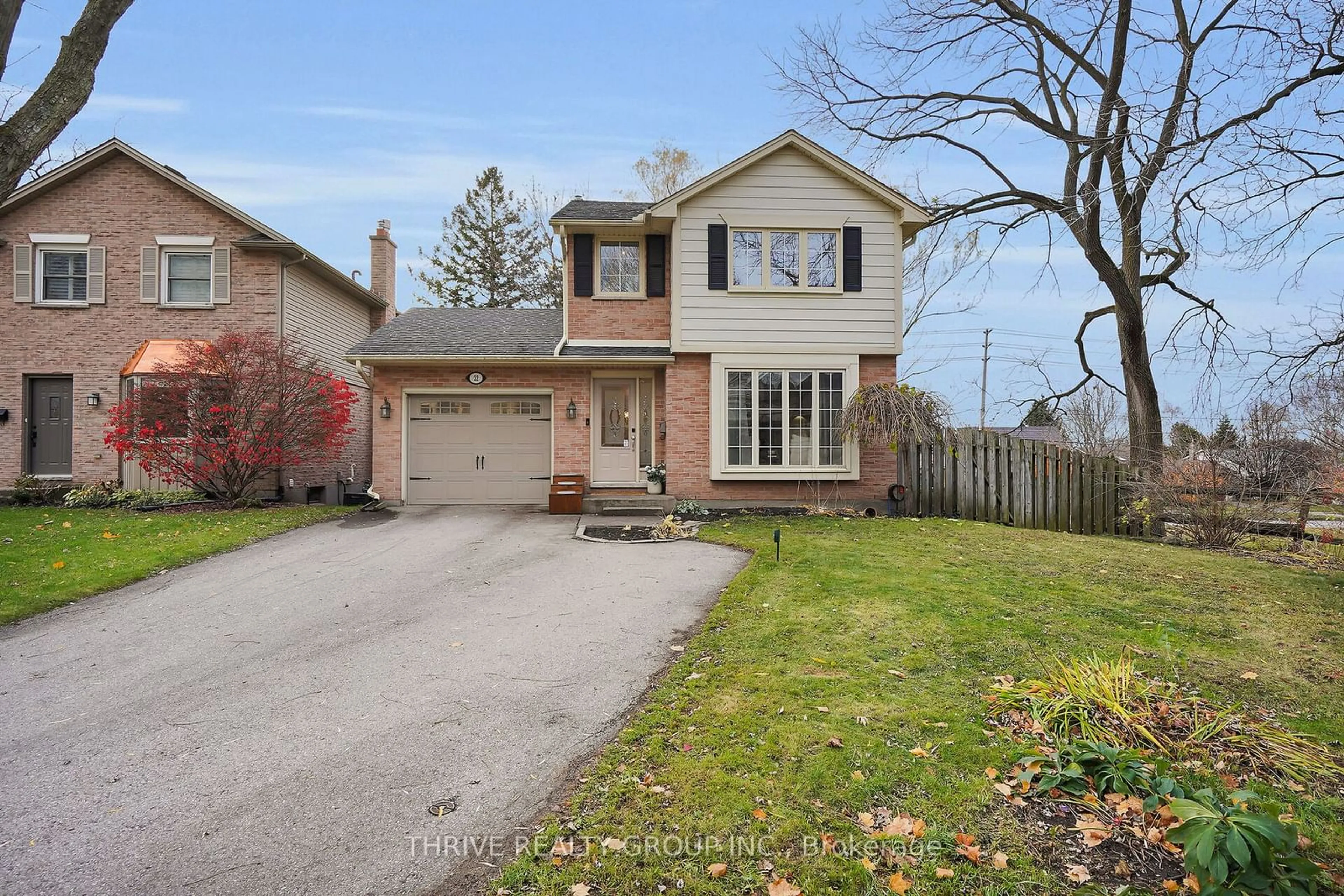 Frontside or backside of a home, the fenced backyard for 22 Westridge Crt, London Ontario N6K 3K6