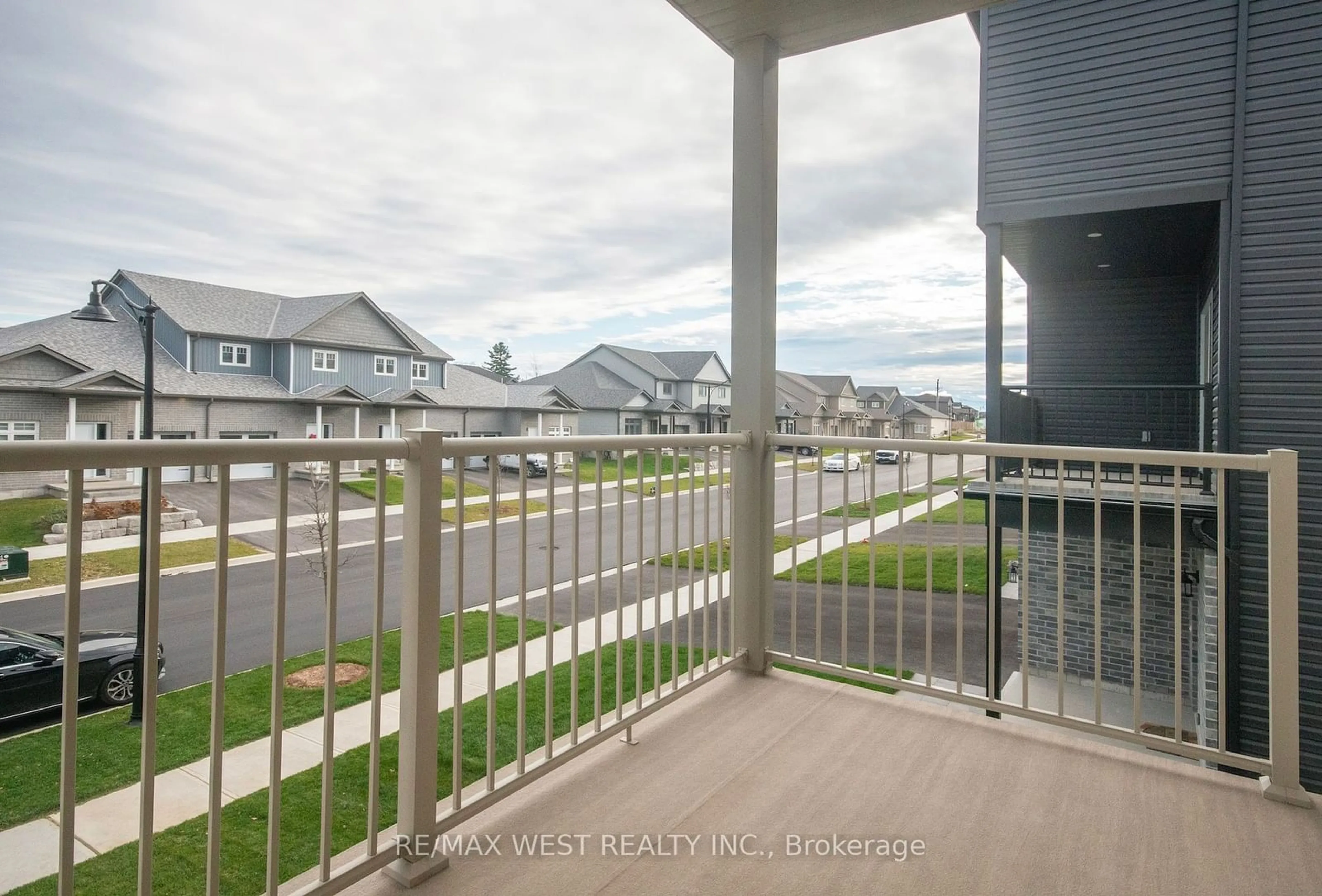 A pic from exterior of the house or condo, the fenced backyard for 43 Markland Ave, Prince Edward County Ontario K0K 2T0