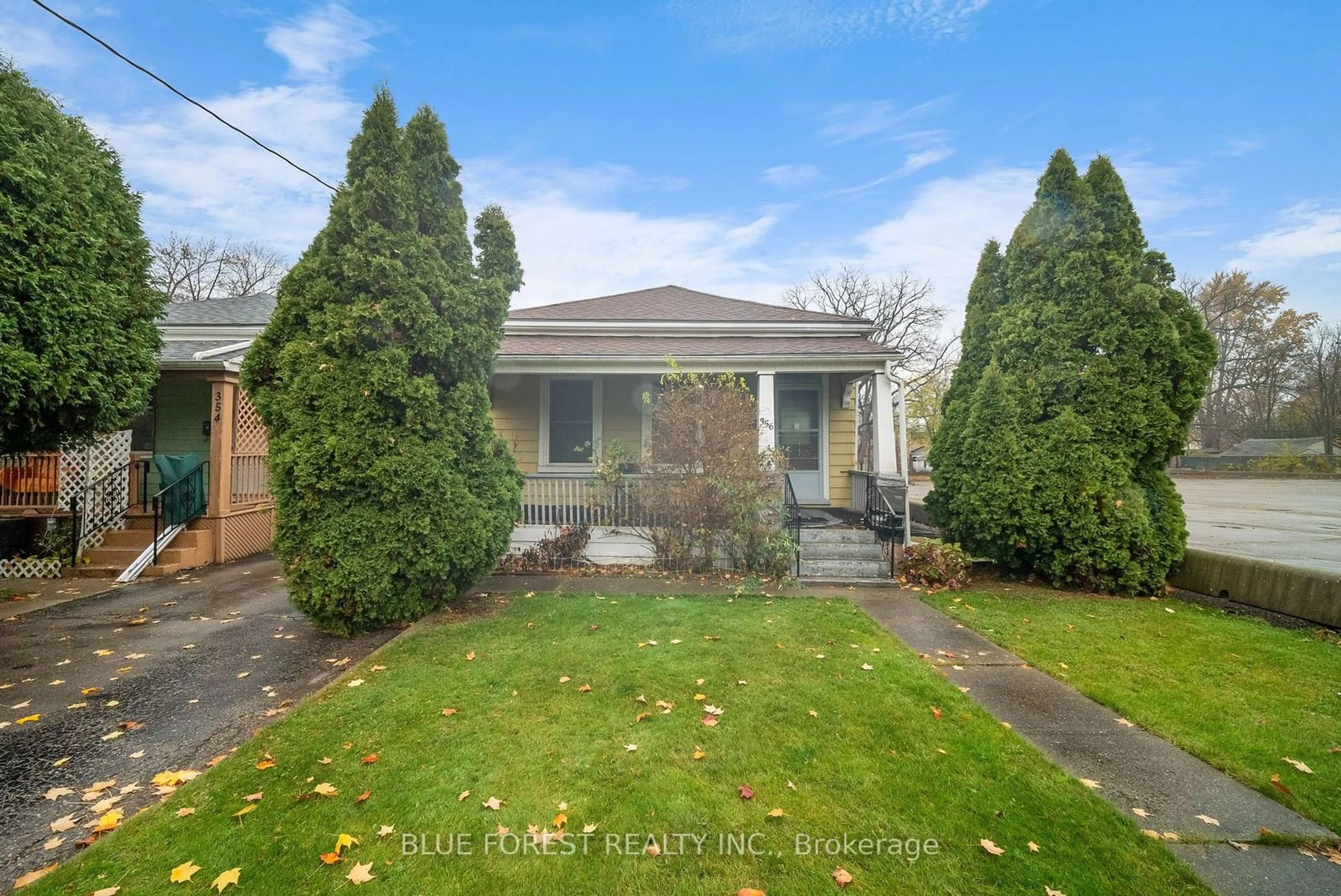 Frontside or backside of a home, the fenced backyard for 356 Hill St, London Ontario N6B 1E3