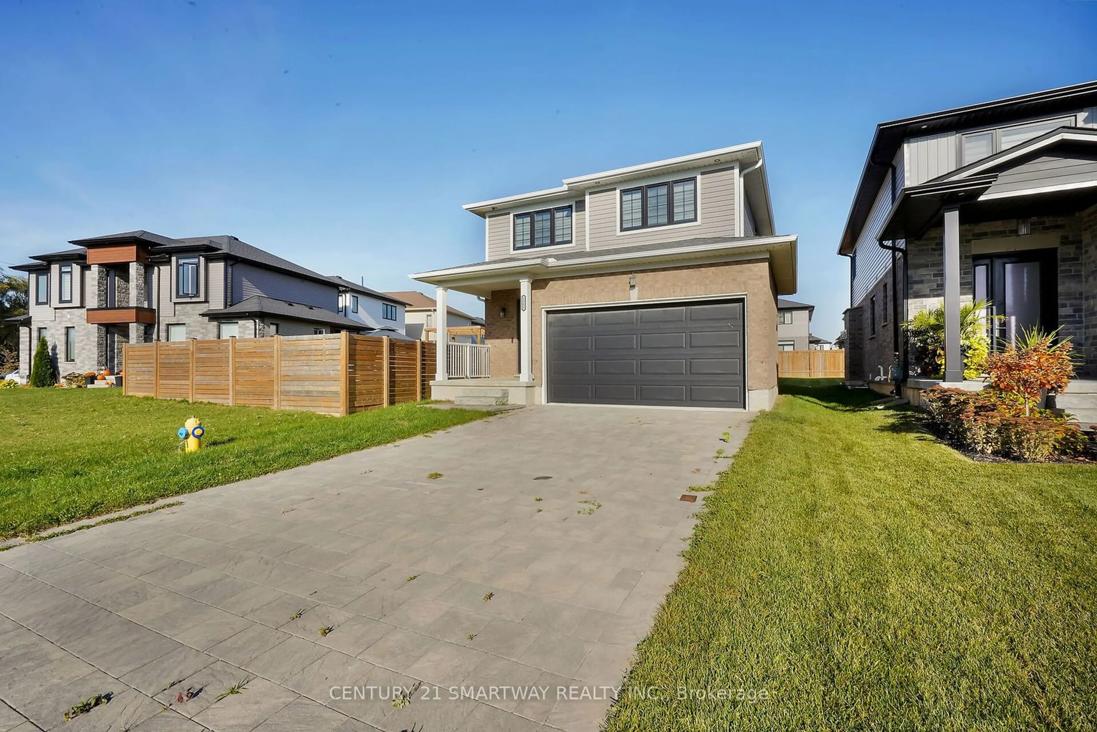 Frontside or backside of a home, the fenced backyard for 1592 Henrica Ave, London Ontario N6G 0S8