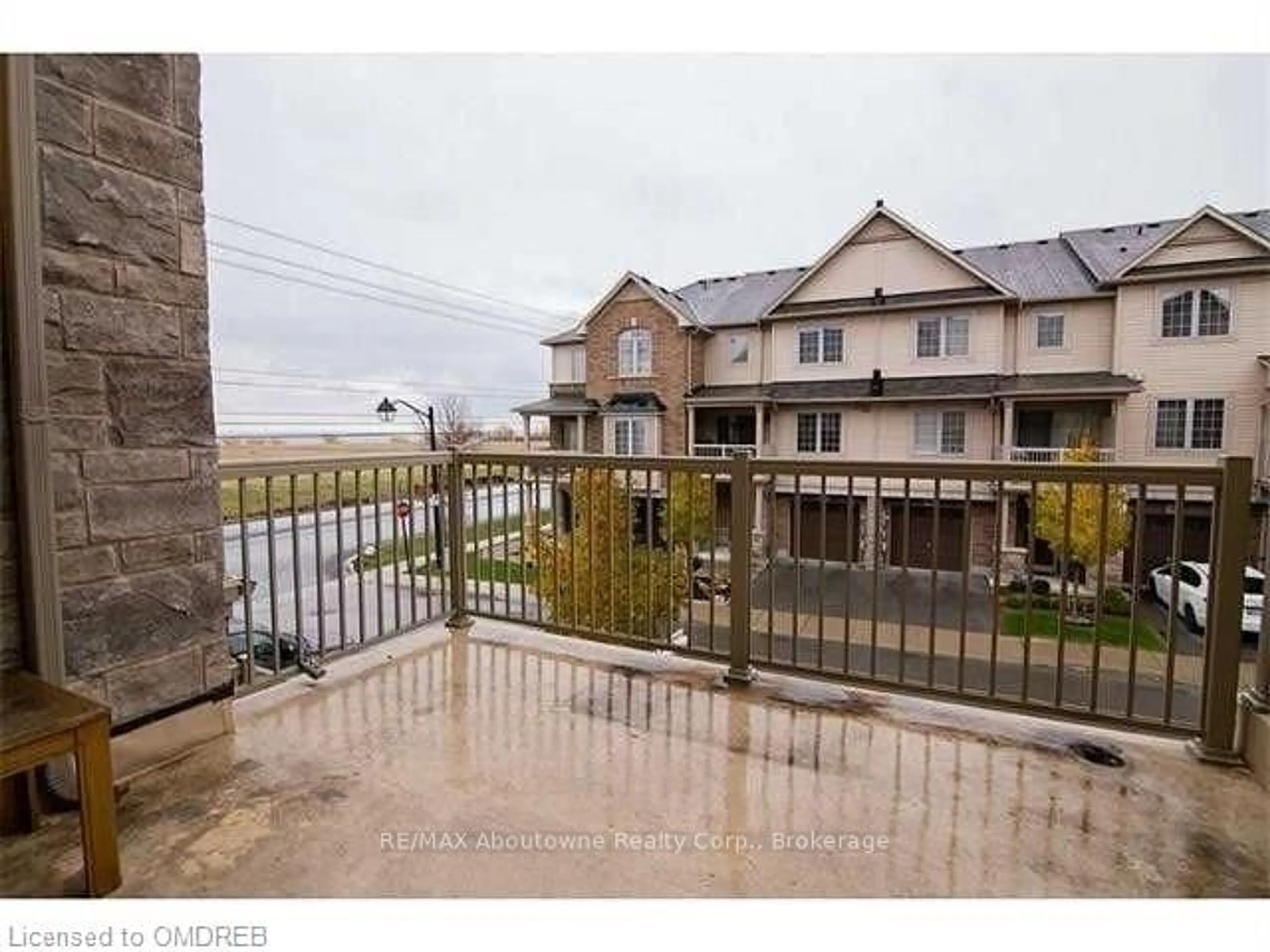 A pic from exterior of the house or condo, the fenced backyard for 541 WINSTON Rd #63, Grimsby Ontario L3M 0C5