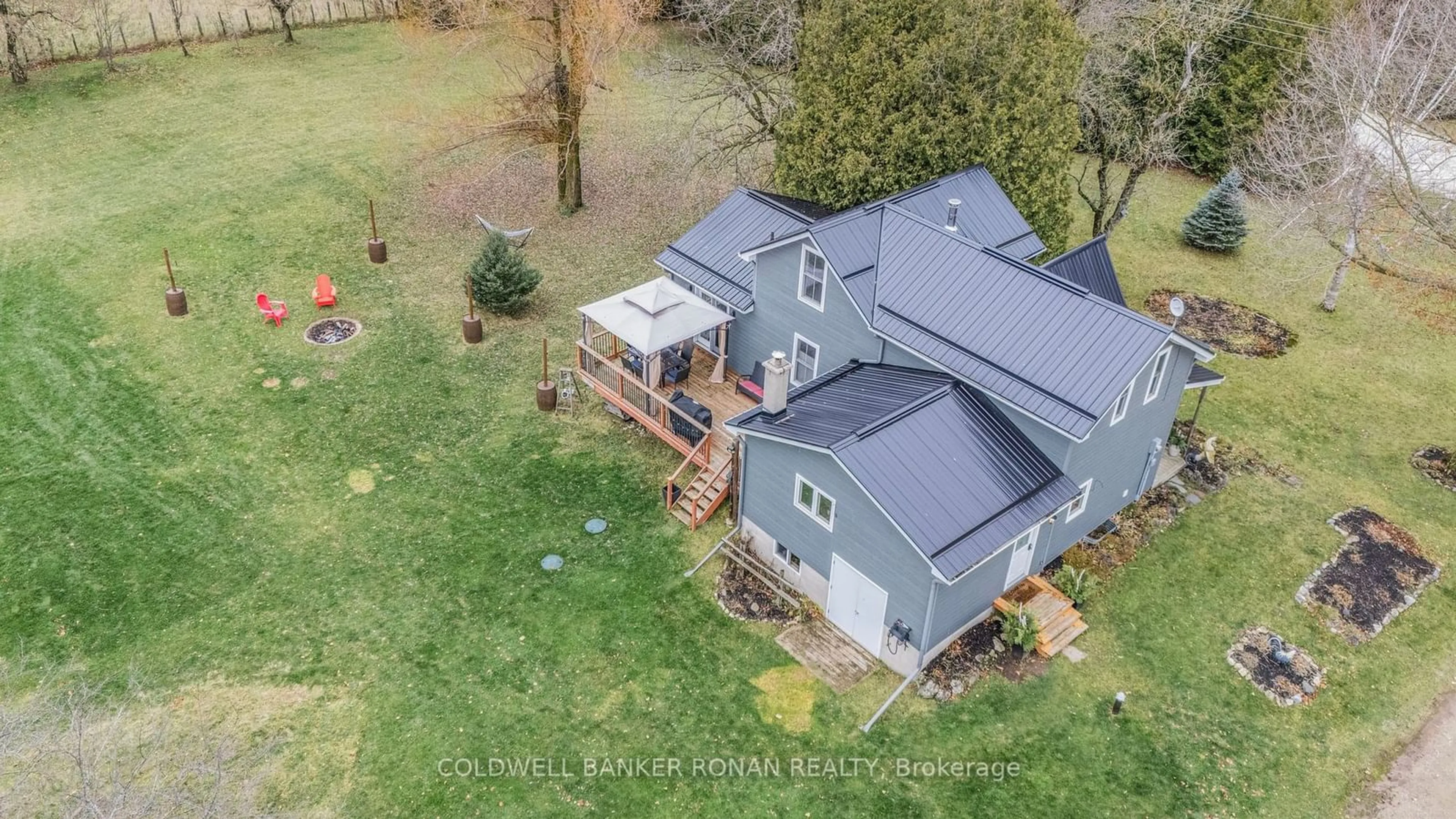 Frontside or backside of a home, the fenced backyard for 625506 Sideroad 15, Melancthon Ontario L9V 1Z5