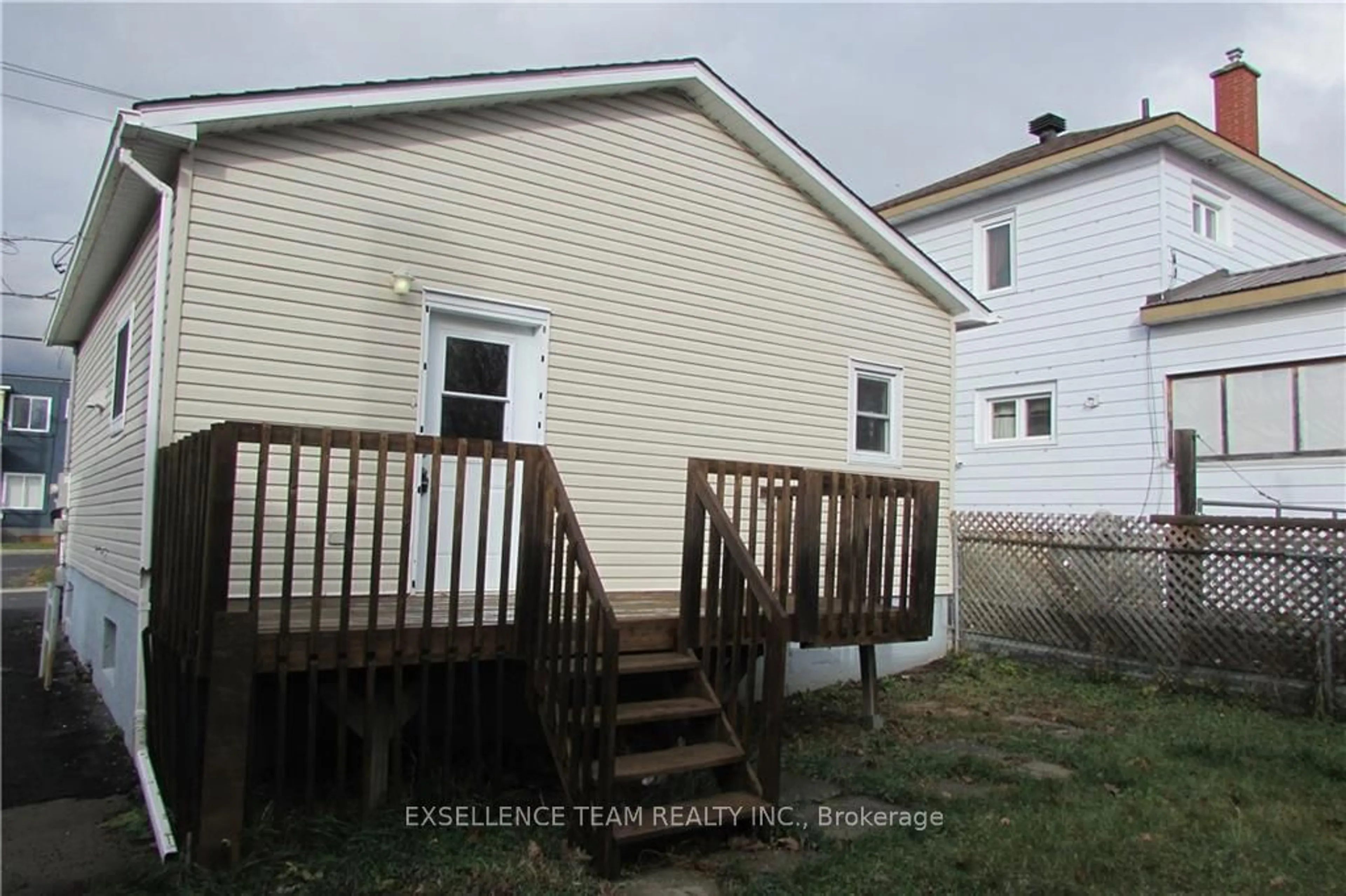 Frontside or backside of a home, the fenced backyard for 408 SEVENTH St, Cornwall Ontario K6H 2S2