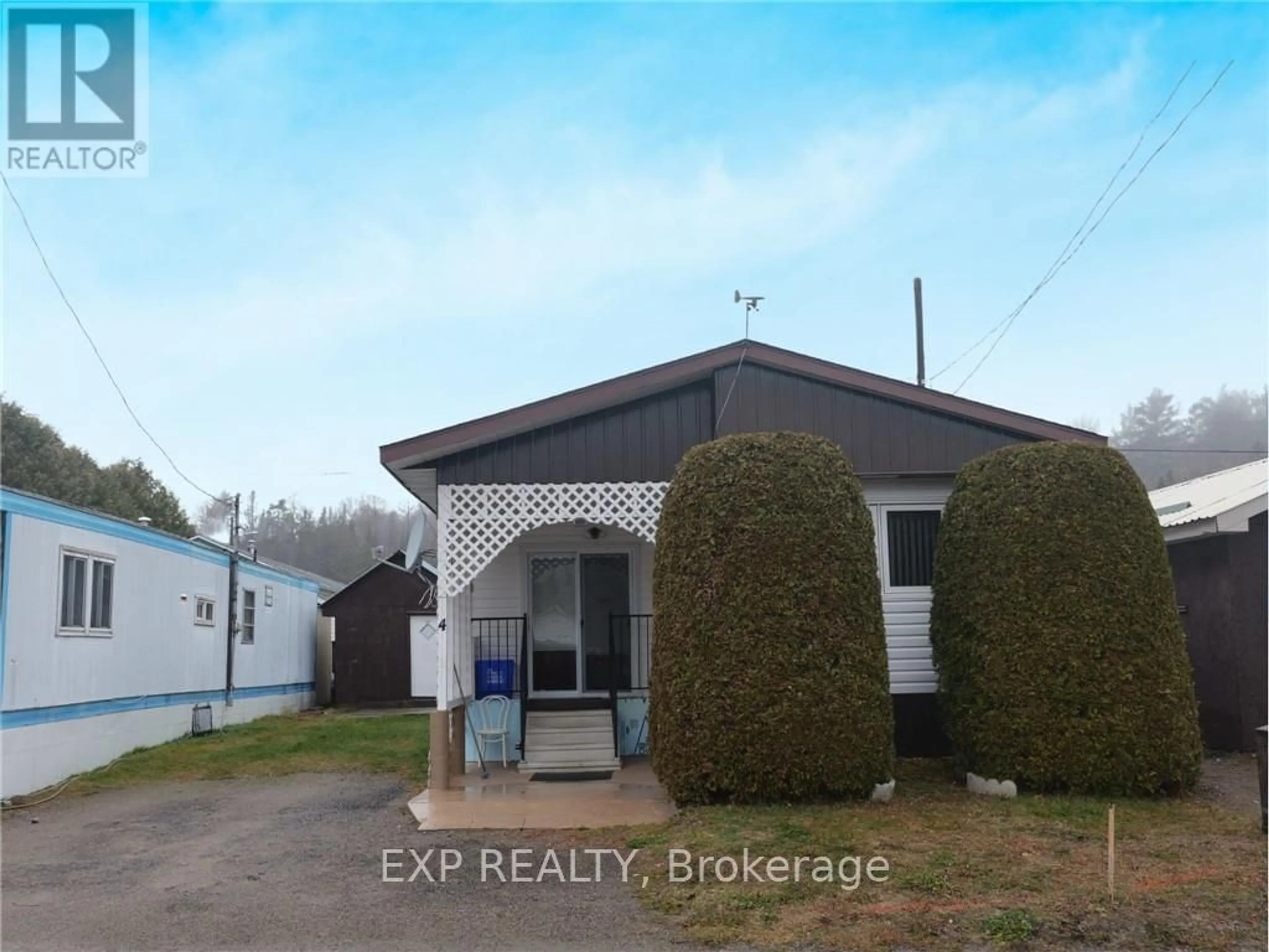 Frontside or backside of a home, the front or back of building for 4 Center St, Greater Sudbury Ontario P0M 2C0