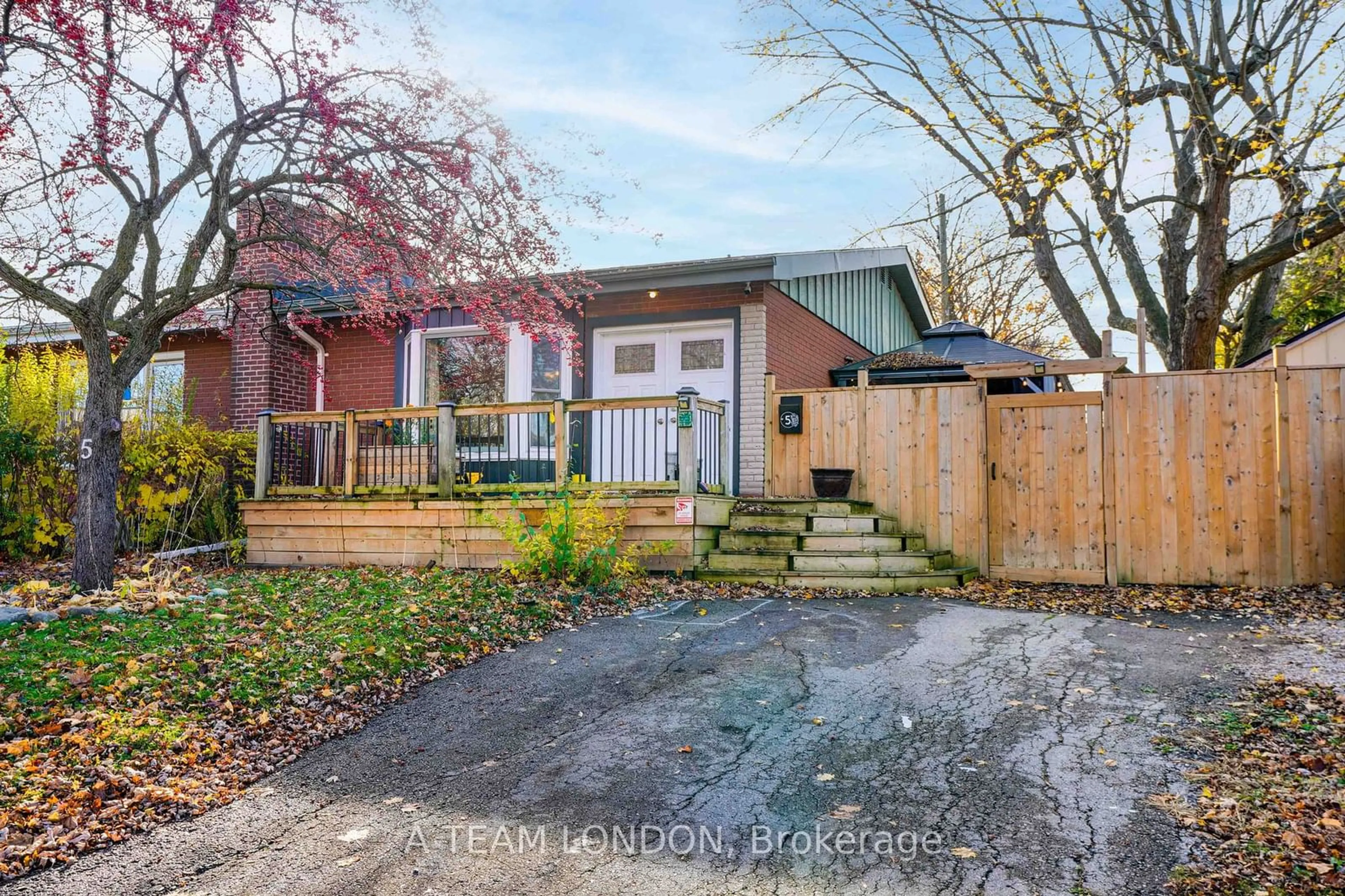 Frontside or backside of a home, the fenced backyard for 5 Almond Rd, London Ontario N5Z 4C1