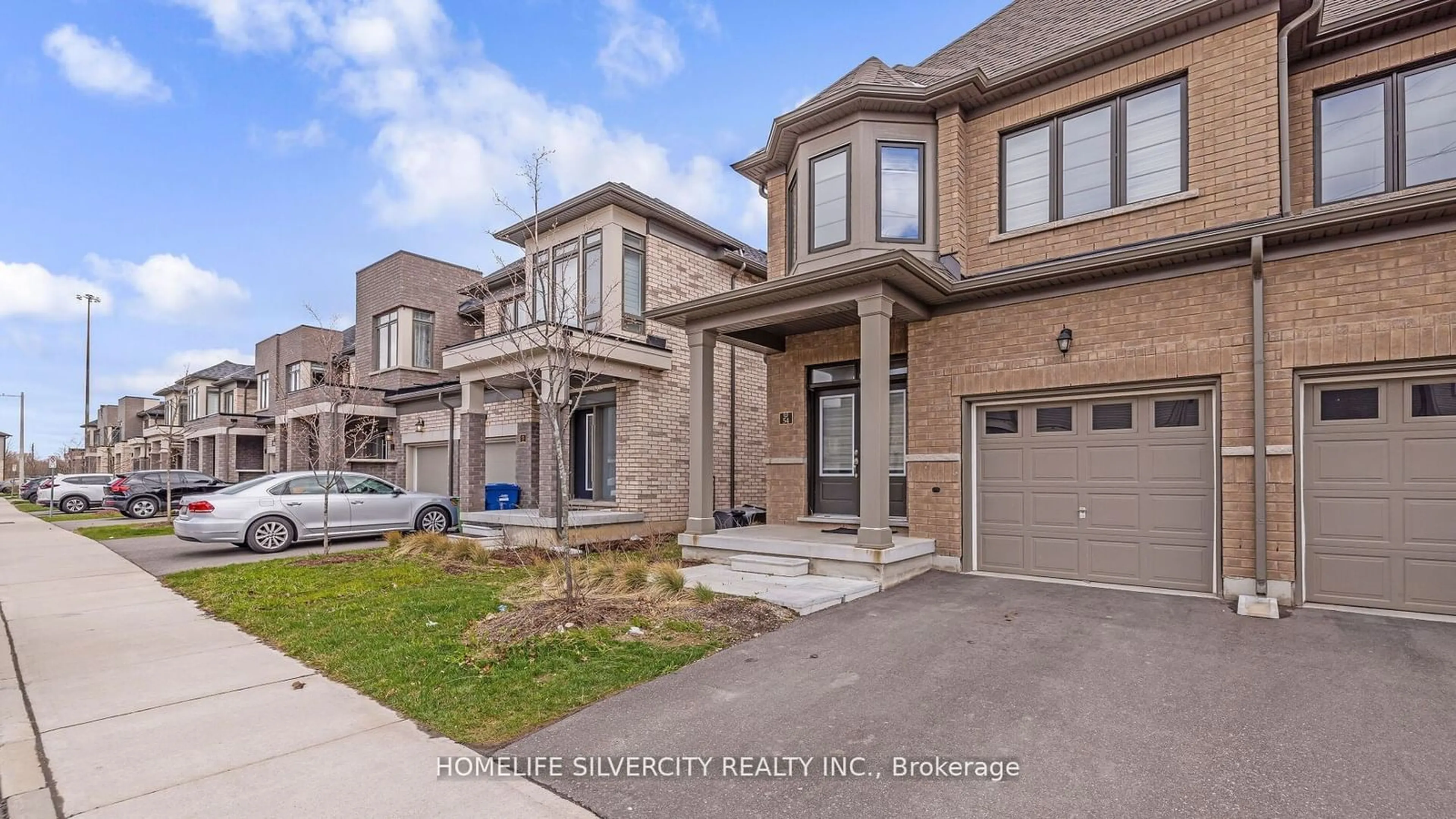 A pic from exterior of the house or condo, the street view for 166 Deerpath Dr #54, Guelph Ontario N1K 1W6