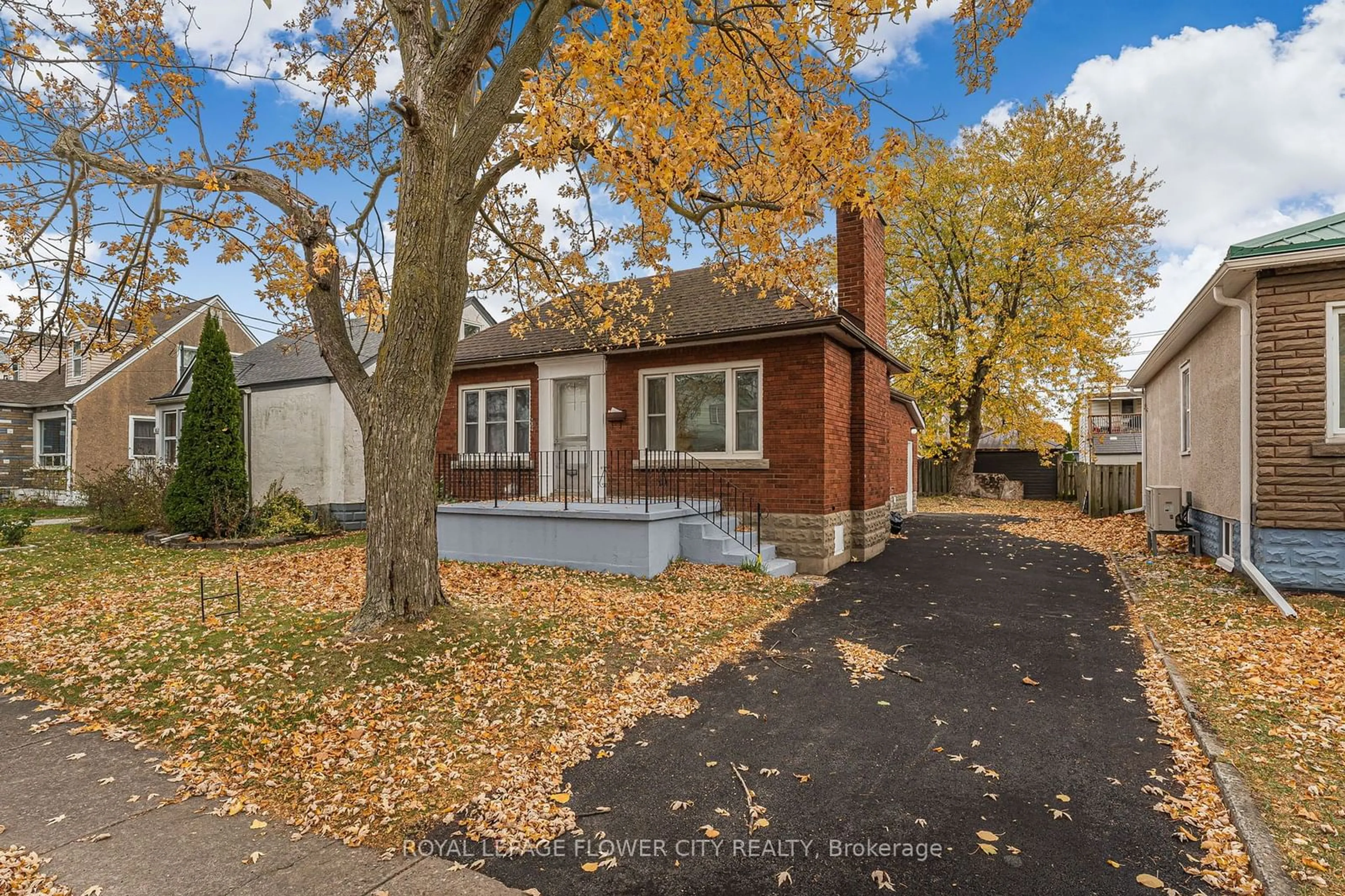 A pic from exterior of the house or condo, the fenced backyard for 304 Wallace Ave, Welland Ontario L3B 1R9