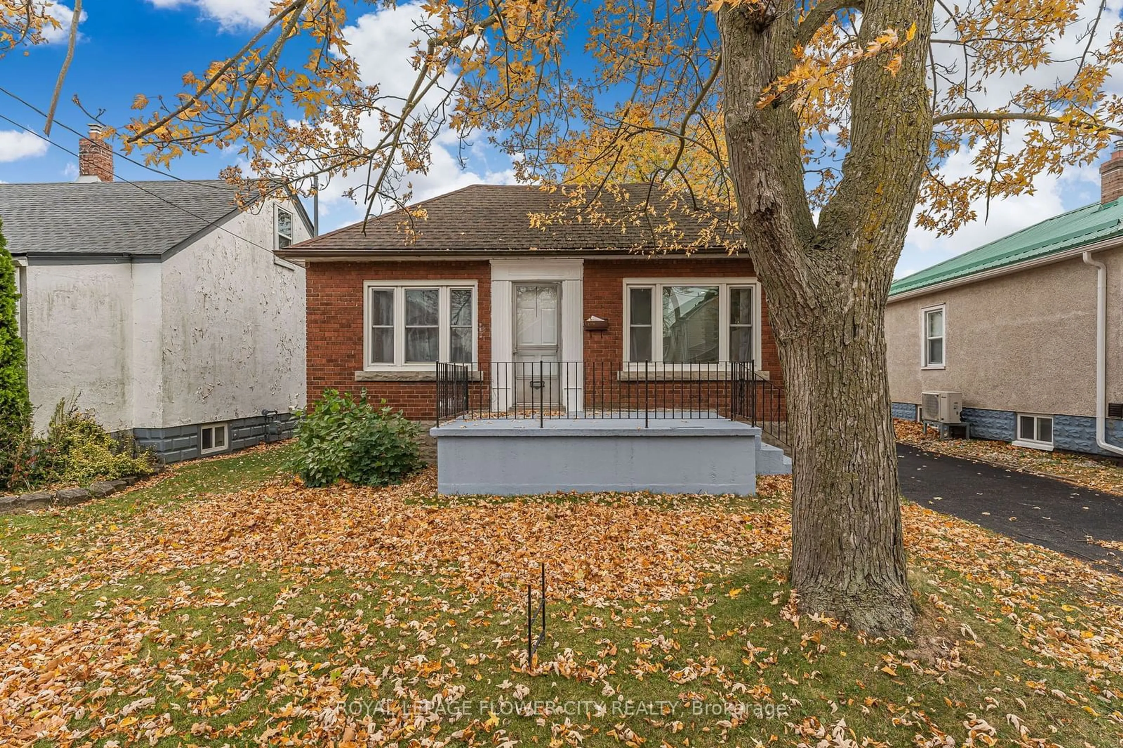 A pic from exterior of the house or condo, the fenced backyard for 304 Wallace Ave, Welland Ontario L3B 1R9