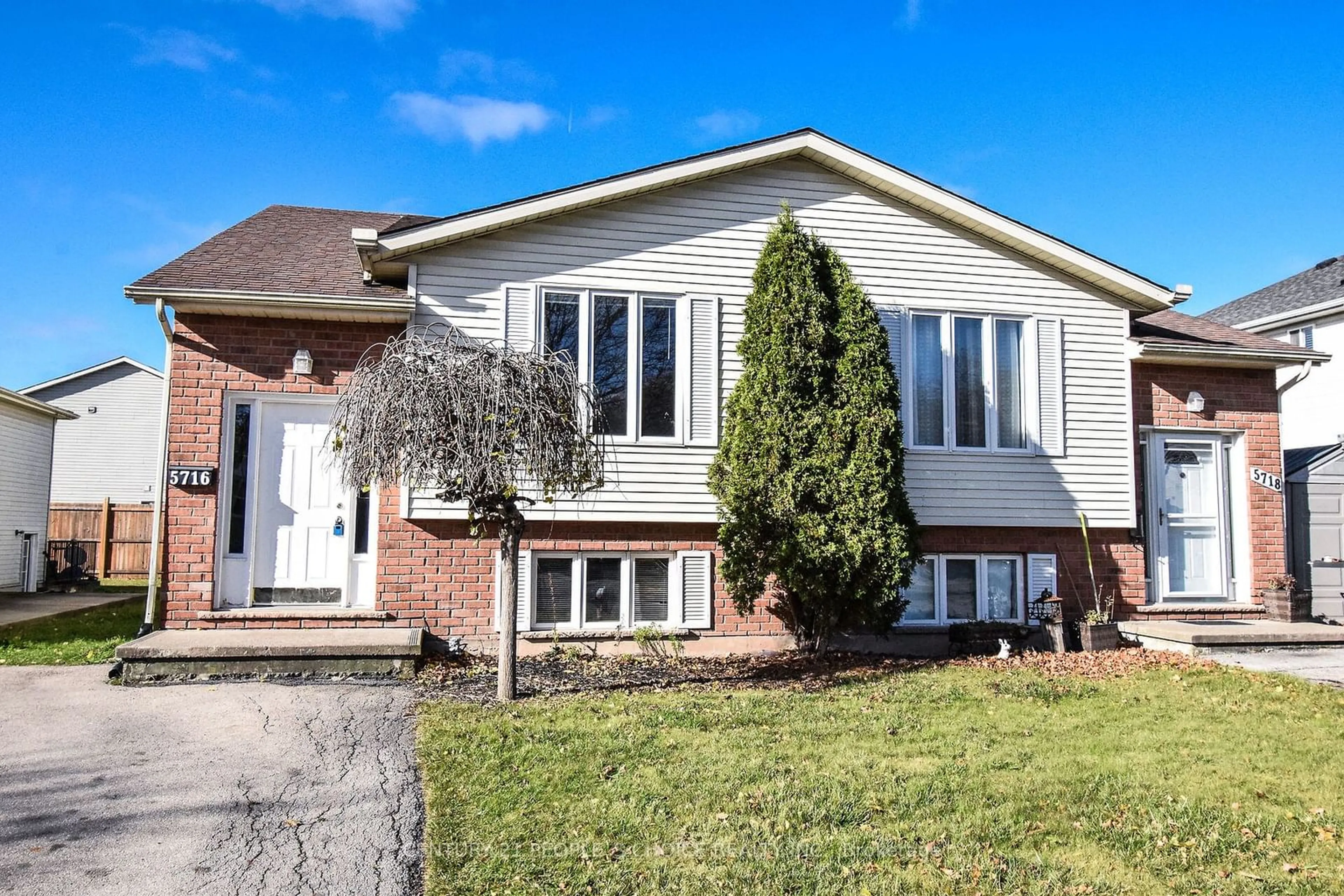 Home with brick exterior material for 5716 Deerbrook St, Niagara Falls Ontario L2G 7V6