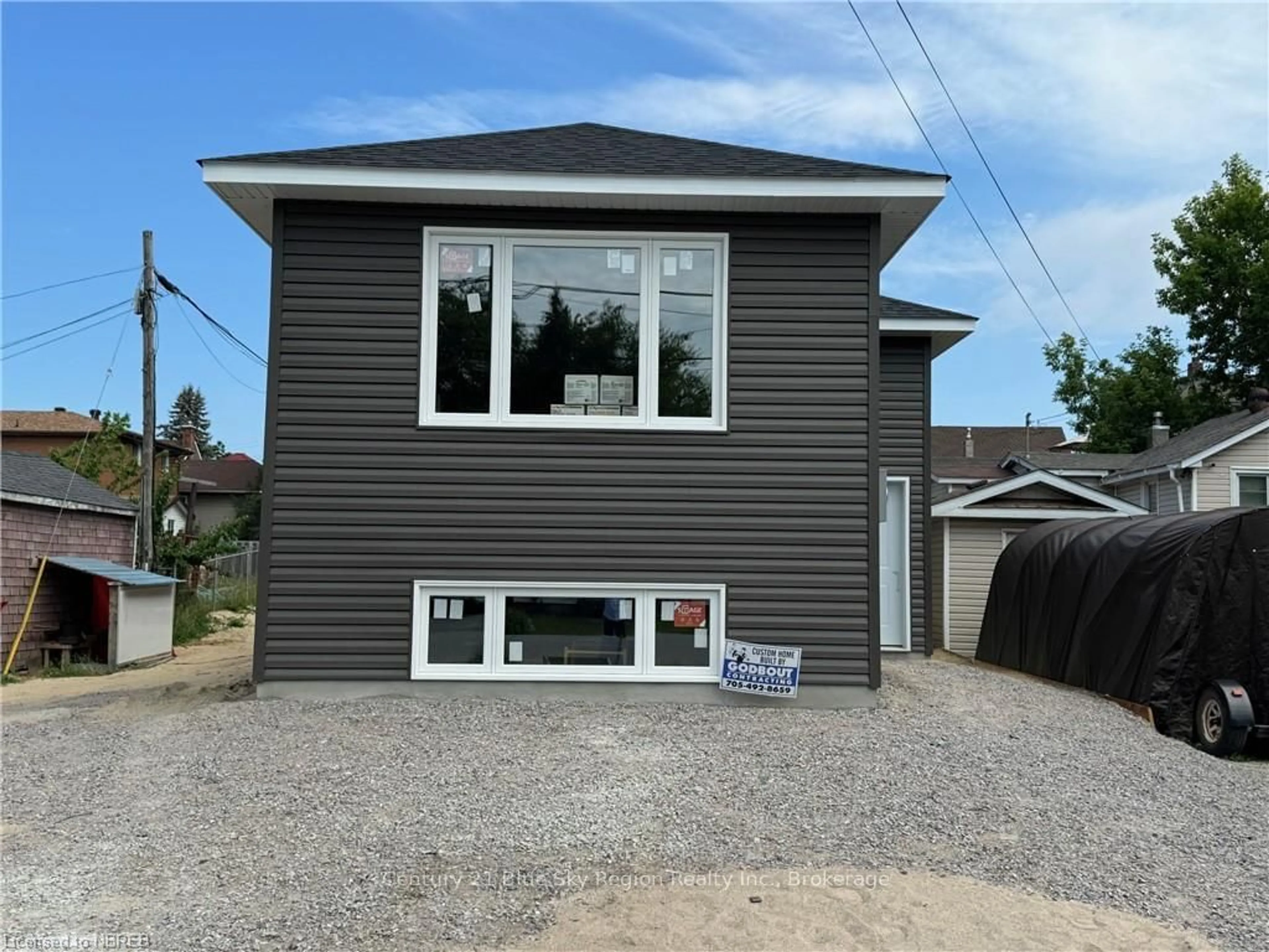 Frontside or backside of a home, the front or back of building for 1556 FRASER St, North Bay Ontario P1B 3Z2