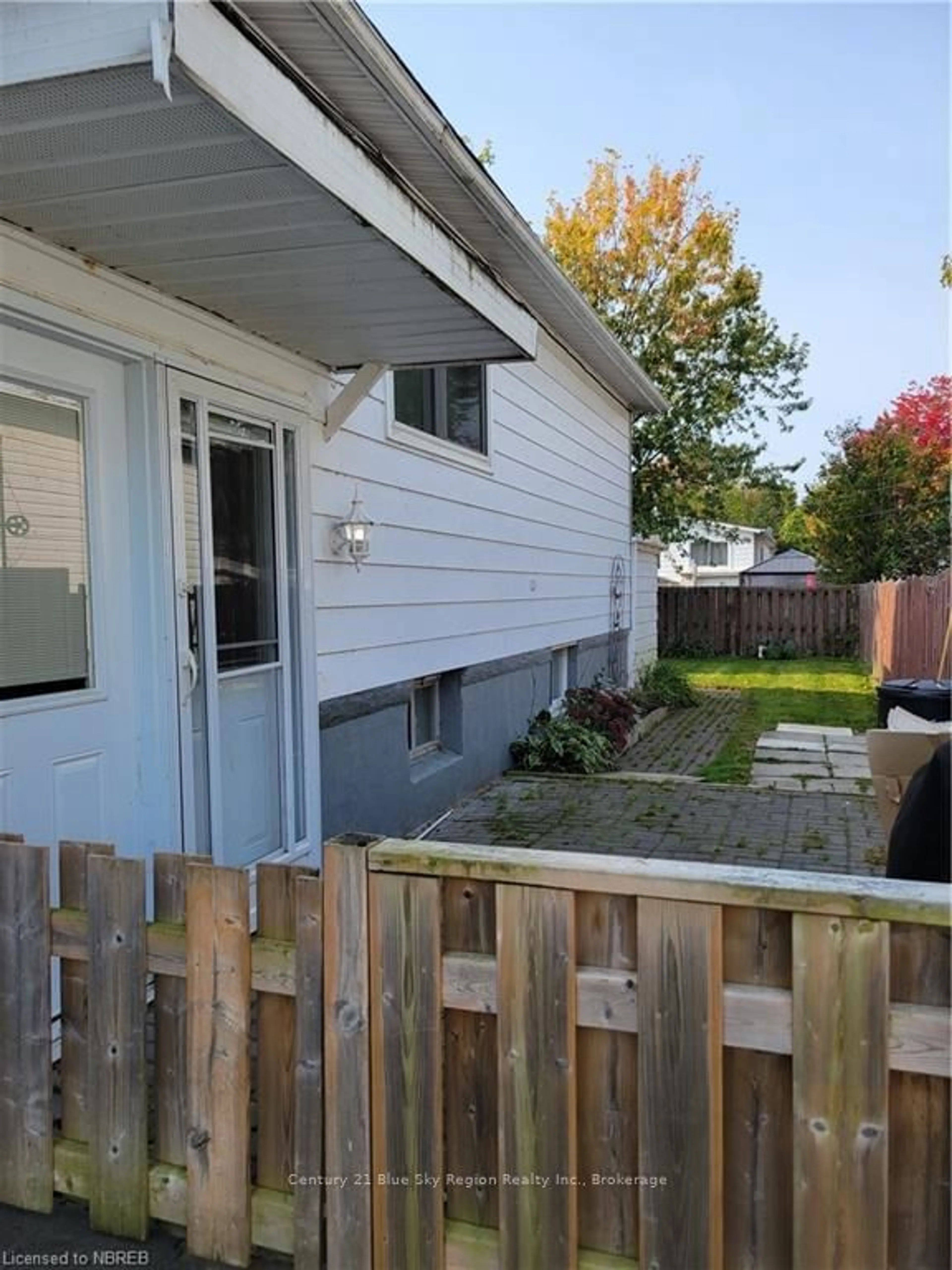 Frontside or backside of a home, the fenced backyard for 28 RYAN Ave, North Bay Ontario P1A 3W7