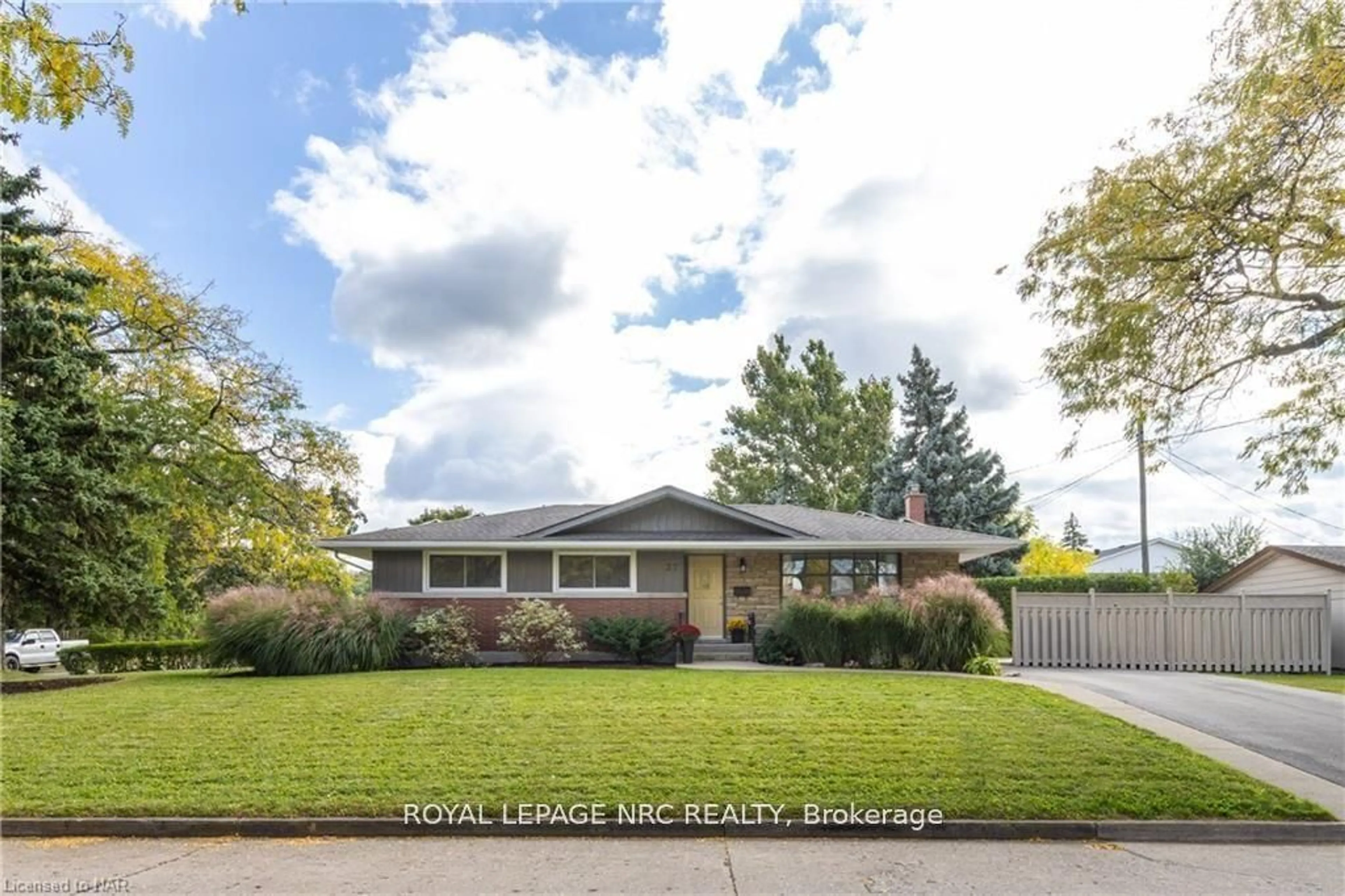 Frontside or backside of a home, the fenced backyard for 37 LARCHWOOD Dr, St. Catharines Ontario L2T 2H6