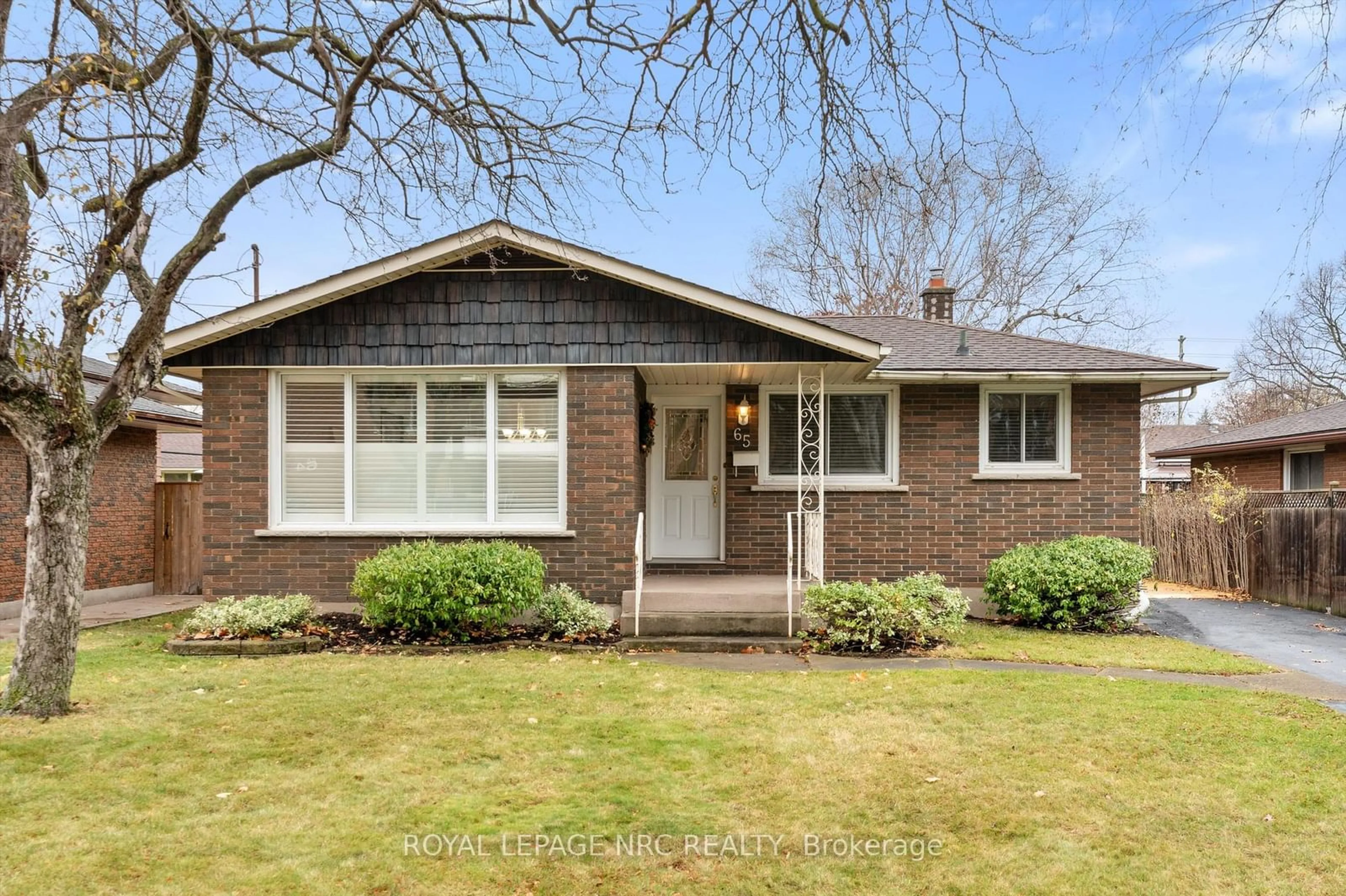 Home with brick exterior material for 65 Windward St, St. Catharines Ontario L2M 4B9