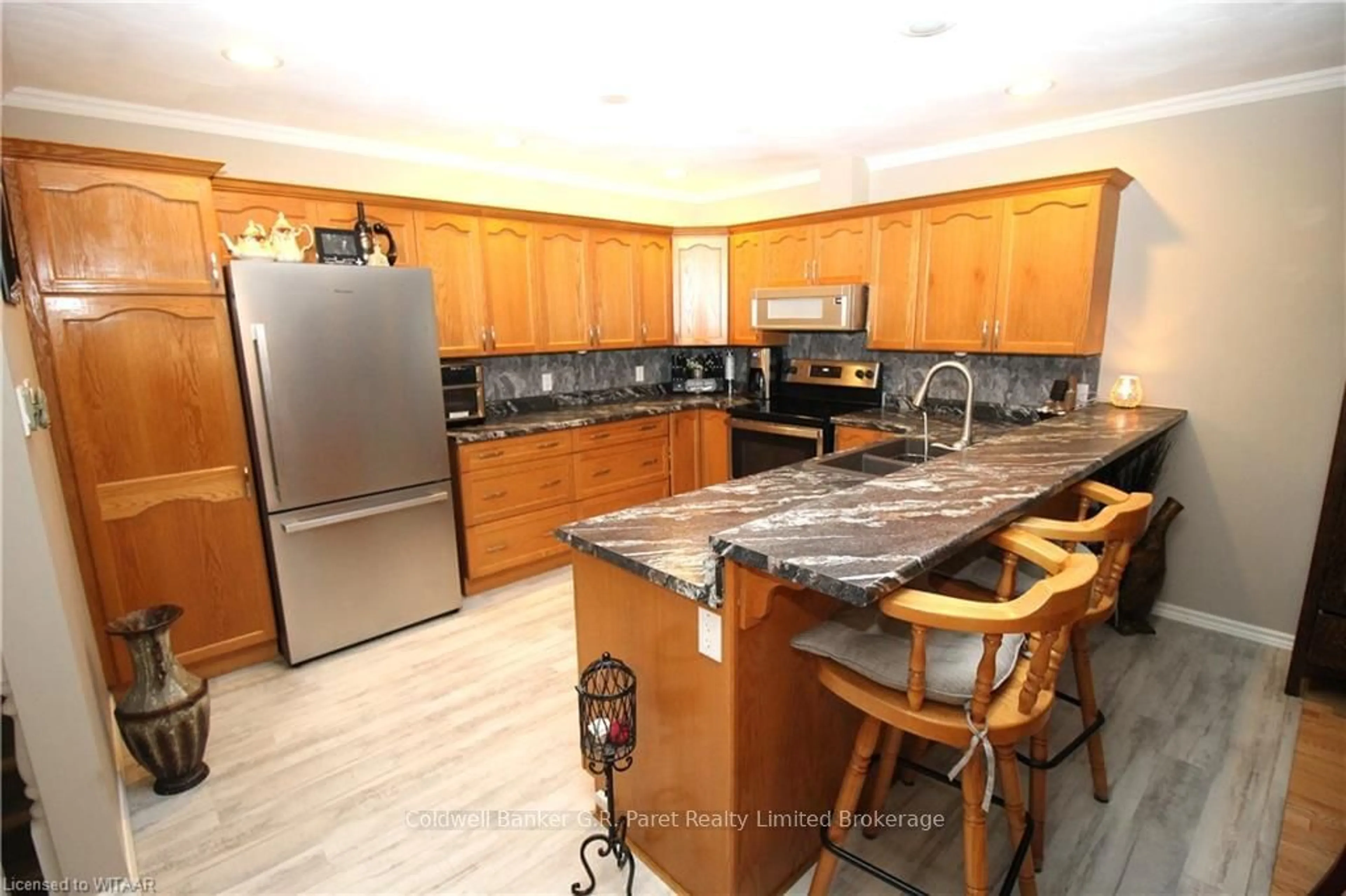 Kitchen, wood floors, cottage for 150 OAK St #5, Norfolk Ontario N3Y 5M5