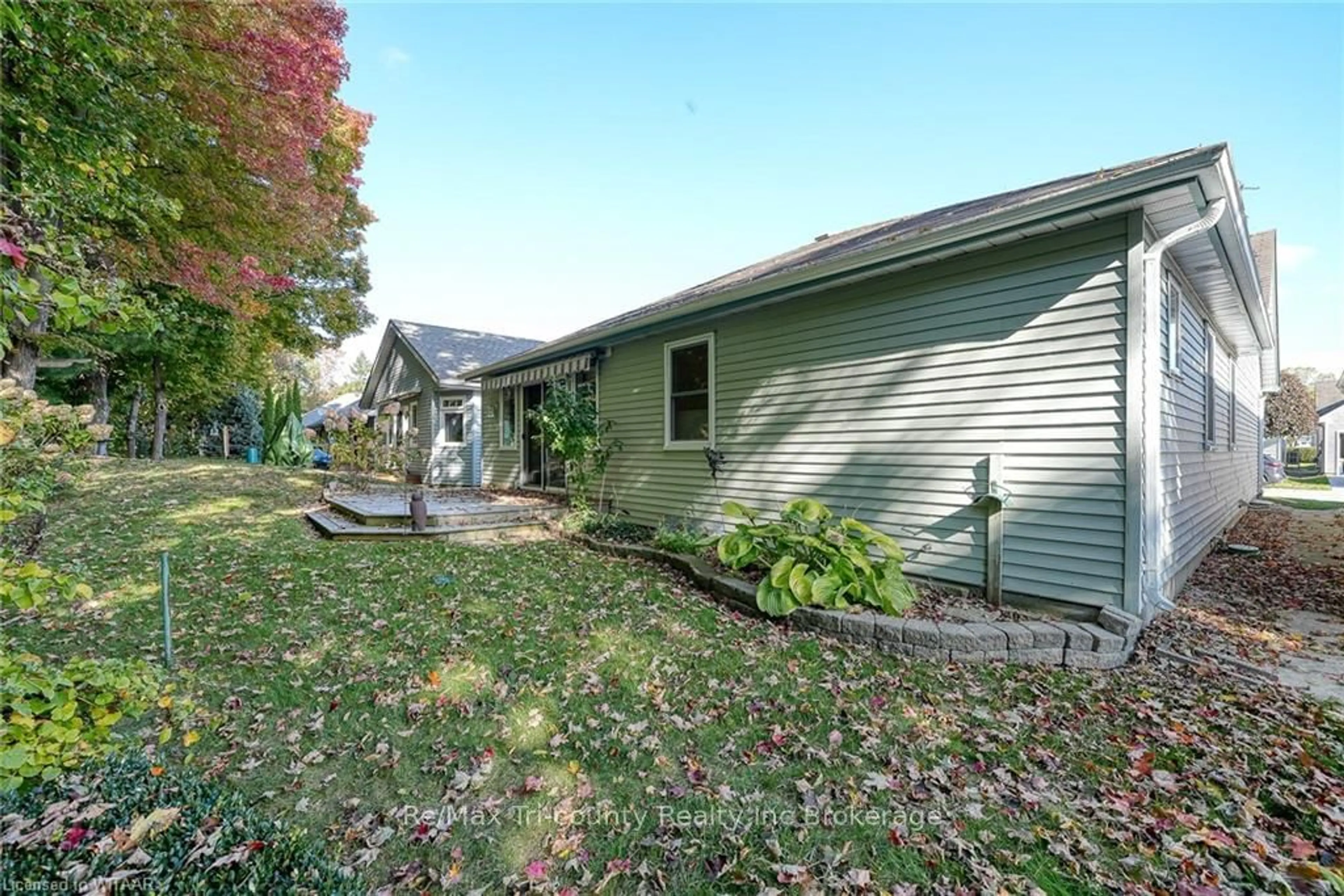 A pic from exterior of the house or condo, the fenced backyard for 18 WILKINS Cres, Tillsonburg Ontario N4G 5M6