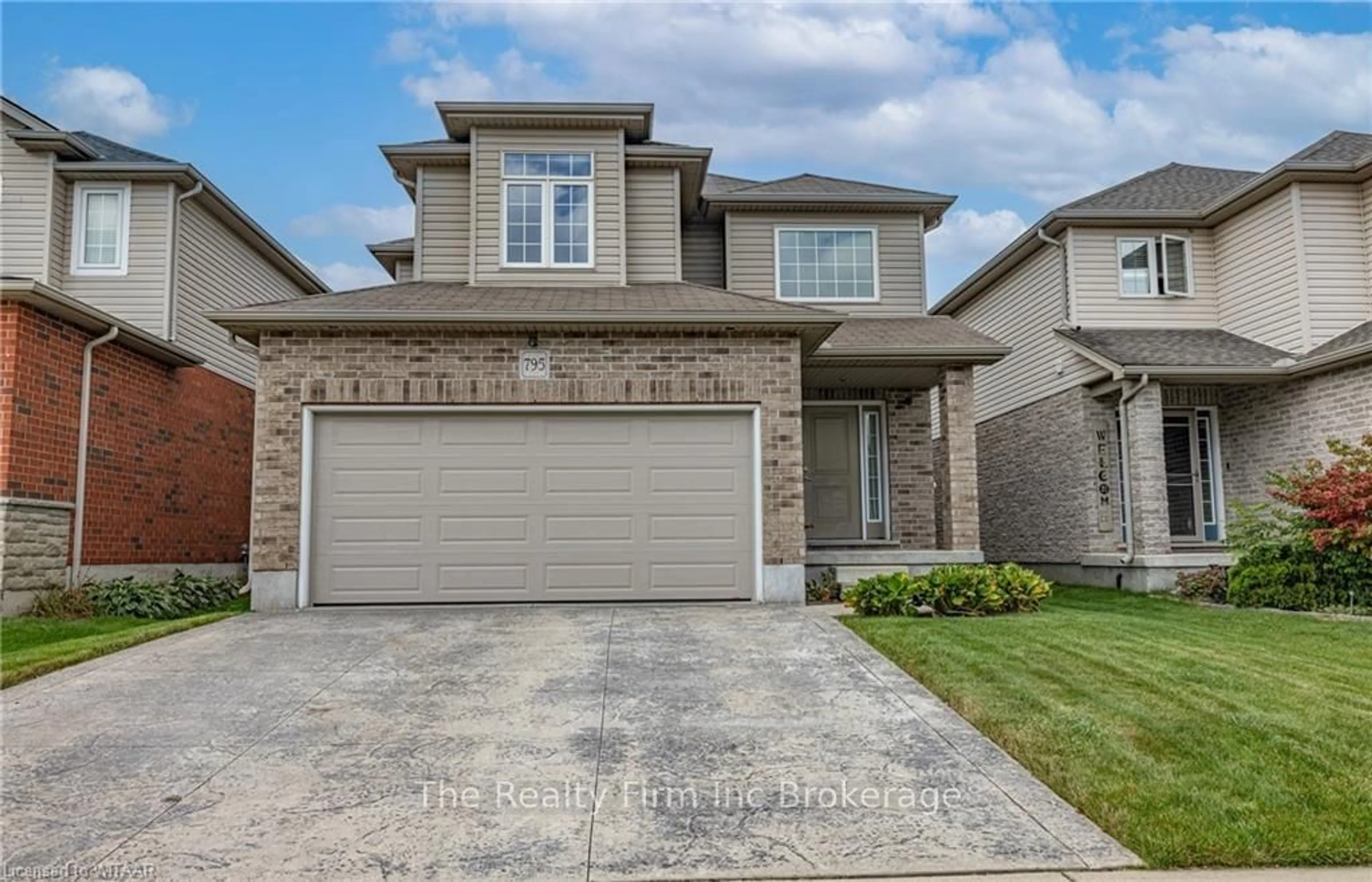 Frontside or backside of a home, the street view for 795 FRONTENAC Cres, Woodstock Ontario N4V 0B1