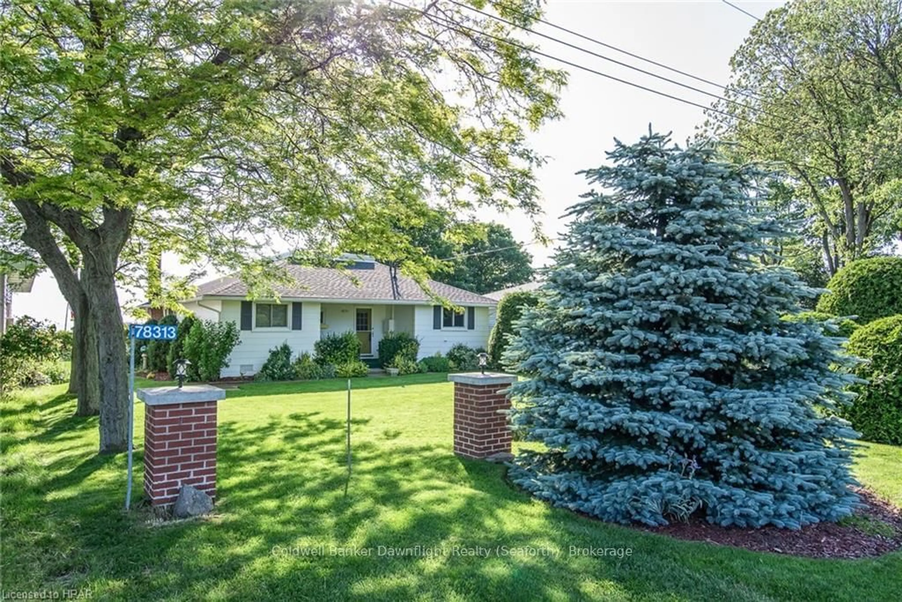 Frontside or backside of a home, the fenced backyard for 78313 JOHN St, Central Huron Ontario N0M 1G0