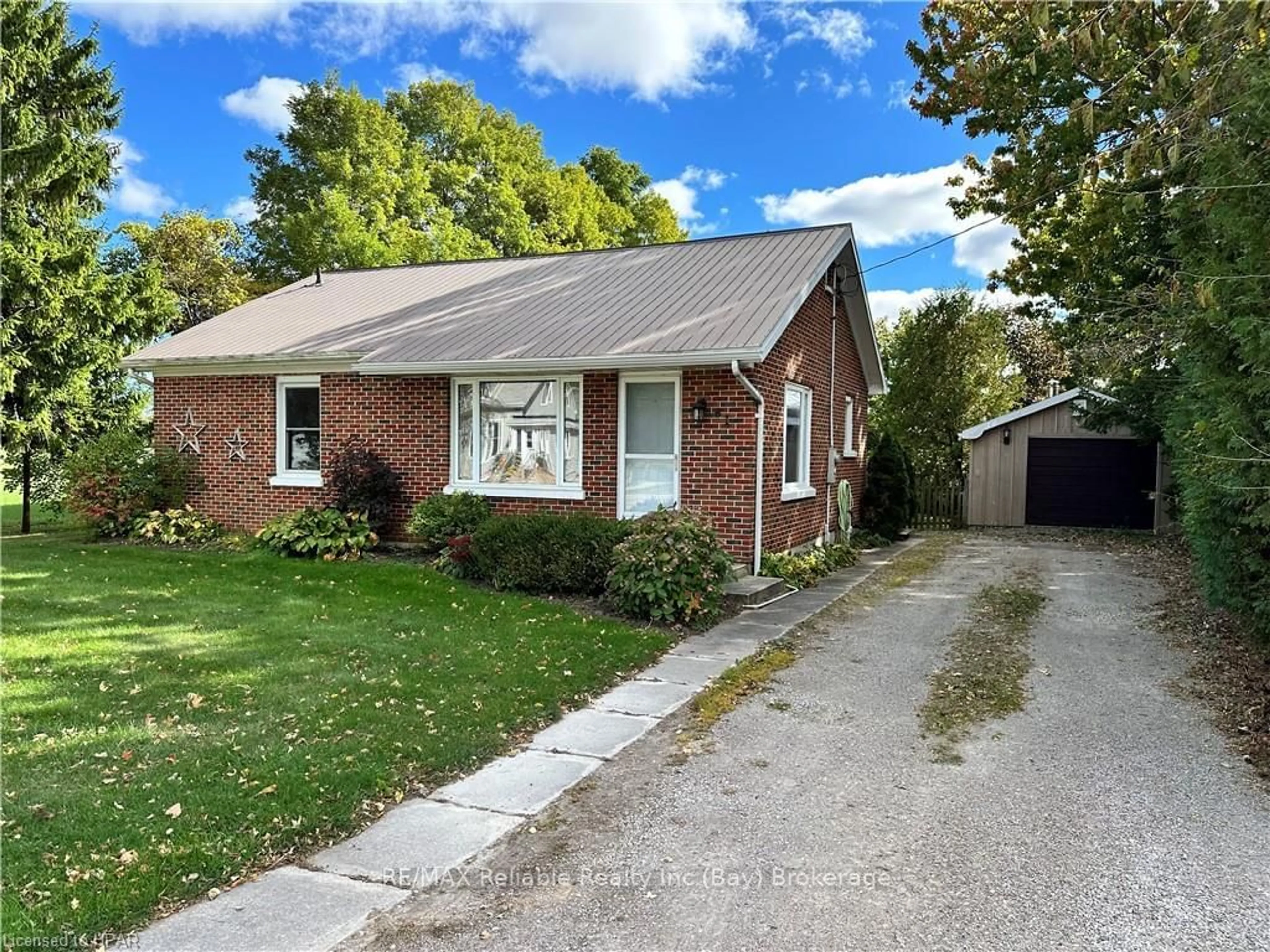 Frontside or backside of a home, the street view for 61 MILL Rd, Huron East Ontario N0M 1J0